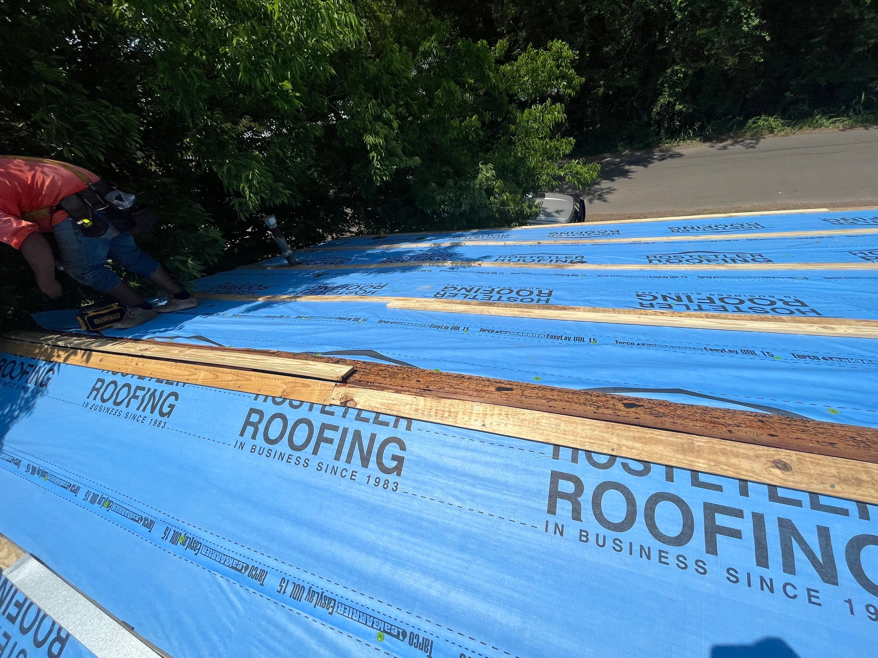 Residential Roofing Installation using 29 Gauge Galvalume Metal by Hostetler Roofing