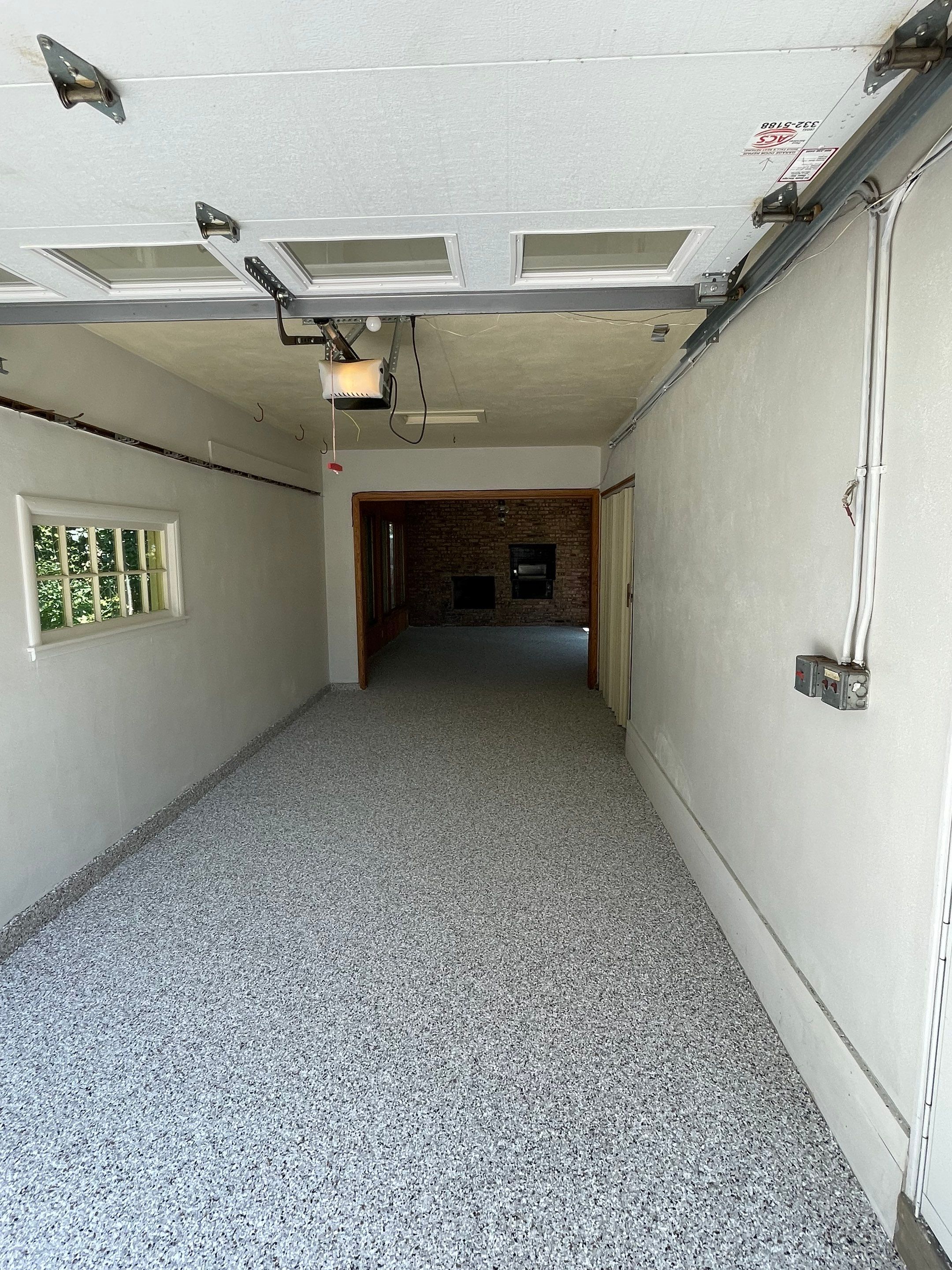 Sioux Falls Garage and Sunroom Concrete Coating with Coyote Flake by Select Painting, Coatings & Garage Cabinets