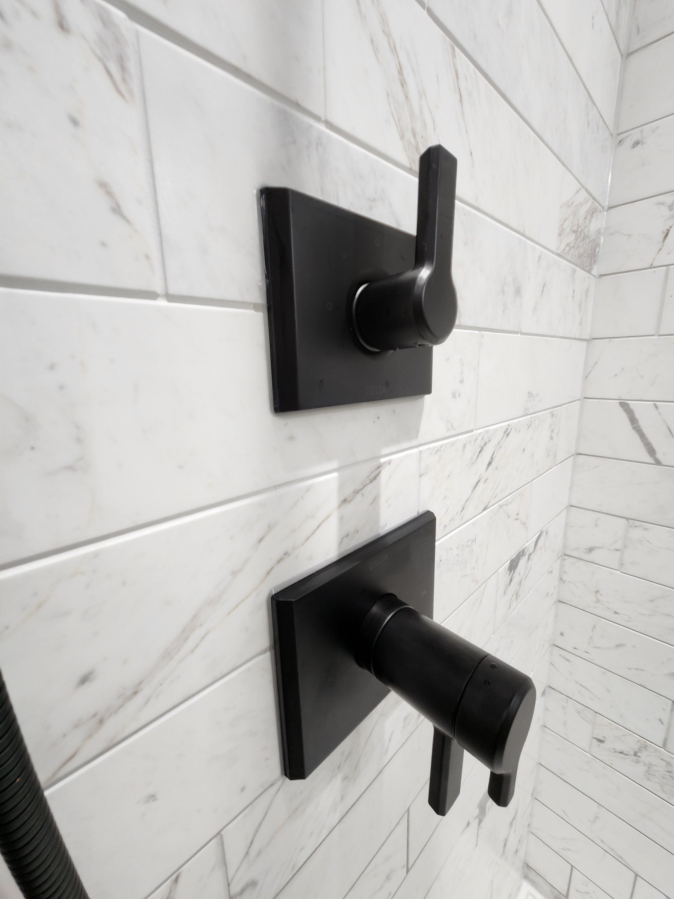 Spring Bathroom Remodel with Black Free-Standing Tub and Walk-In Shower by Legacy Bath and Kitchen