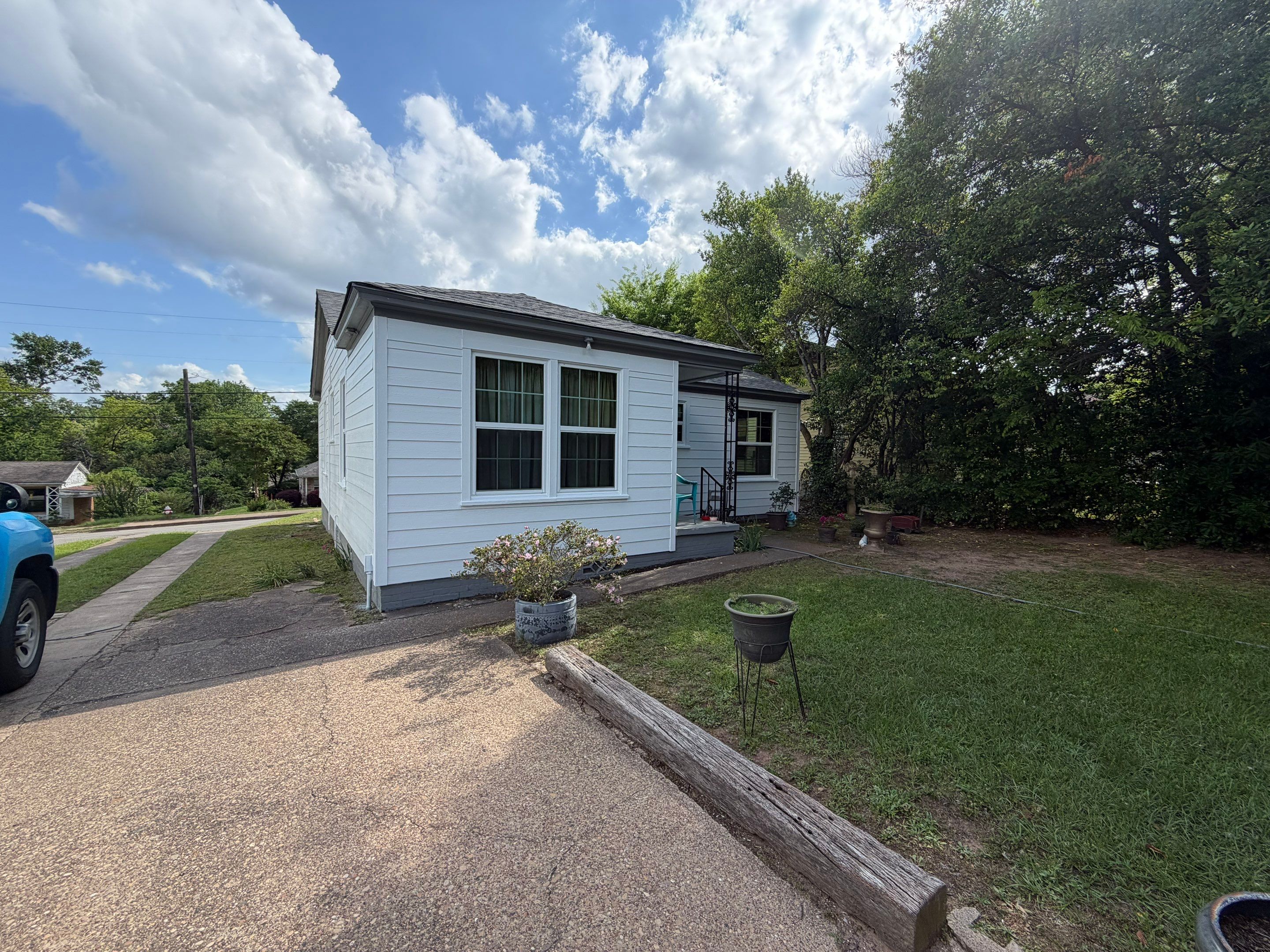A Fresh Start for a Tiny Tyler, Texas Home by Quality Coats Painting