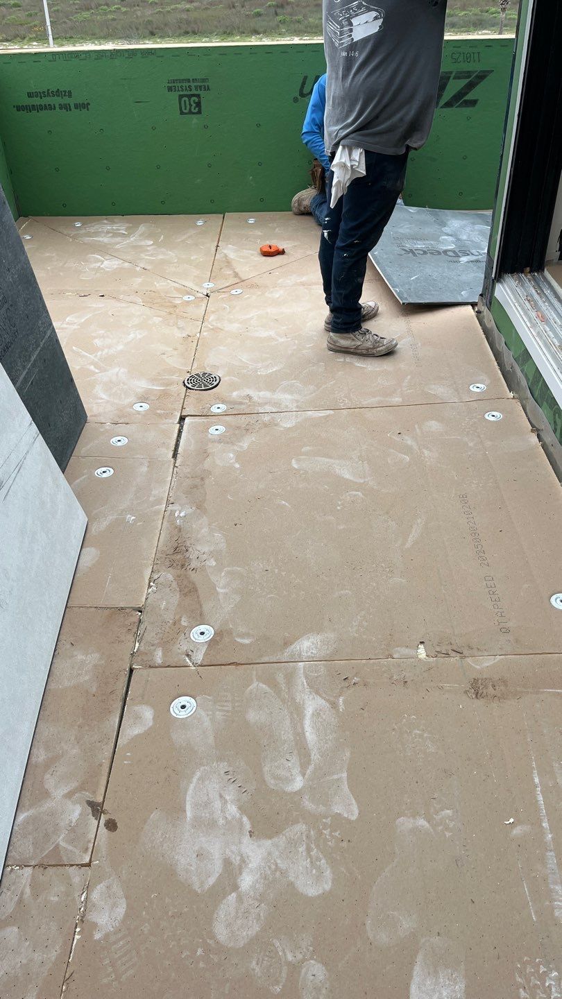 Walk Out, Island Style by Bayfront Roofing and Construction