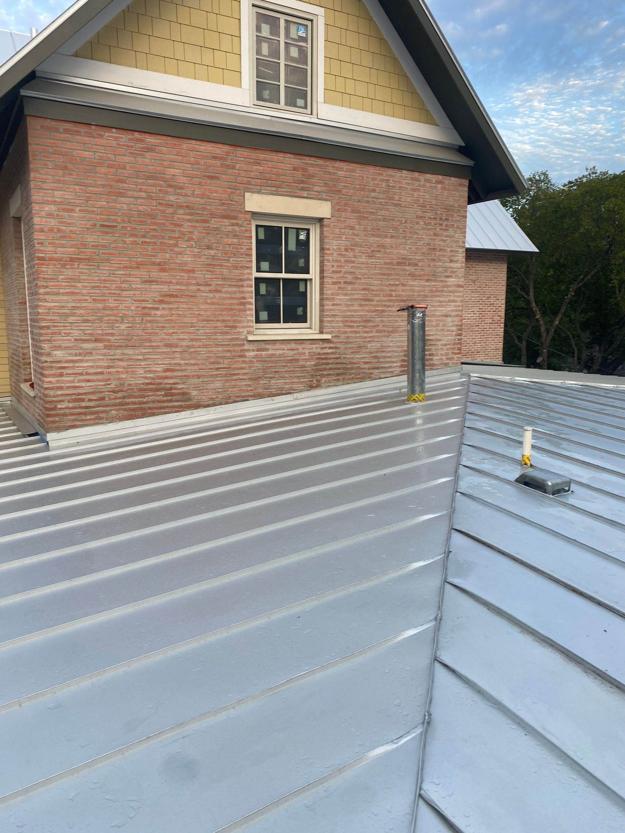 Residential Metal Roof Installation using McElroy Metal by Premier Roofing and Contracting