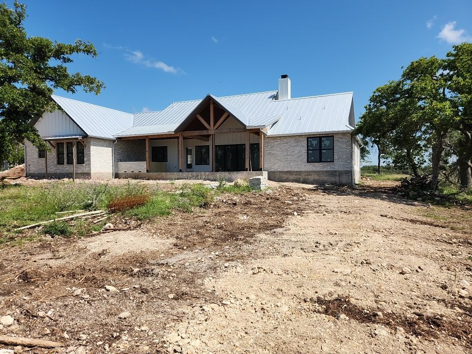 Residential Rainwater Collection System - Pioneer 40K gallon water tank in Mangrove Green by Hill Country Rain Water