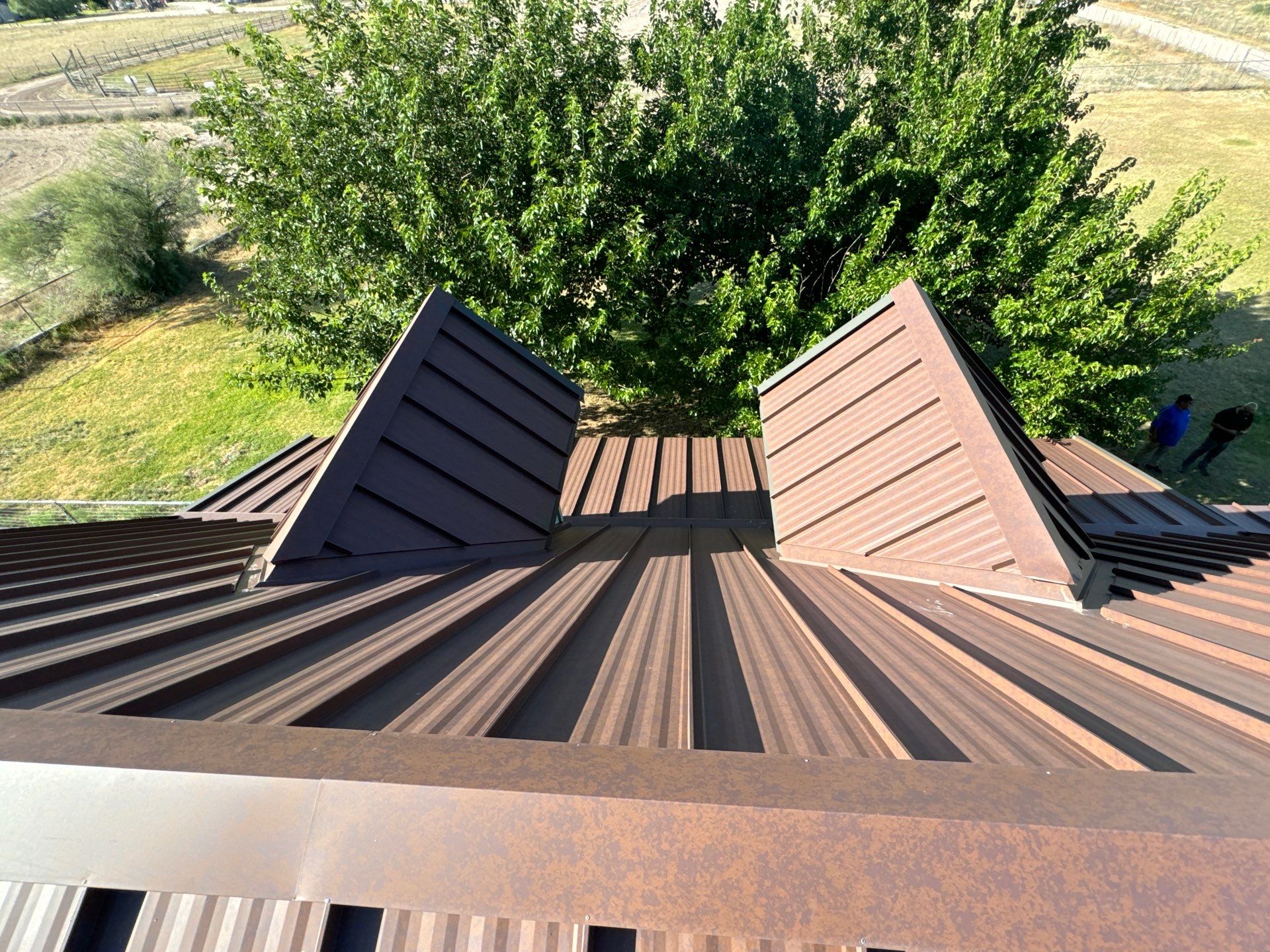 Weathered Rust Standing Seam by Reimagine Roofing