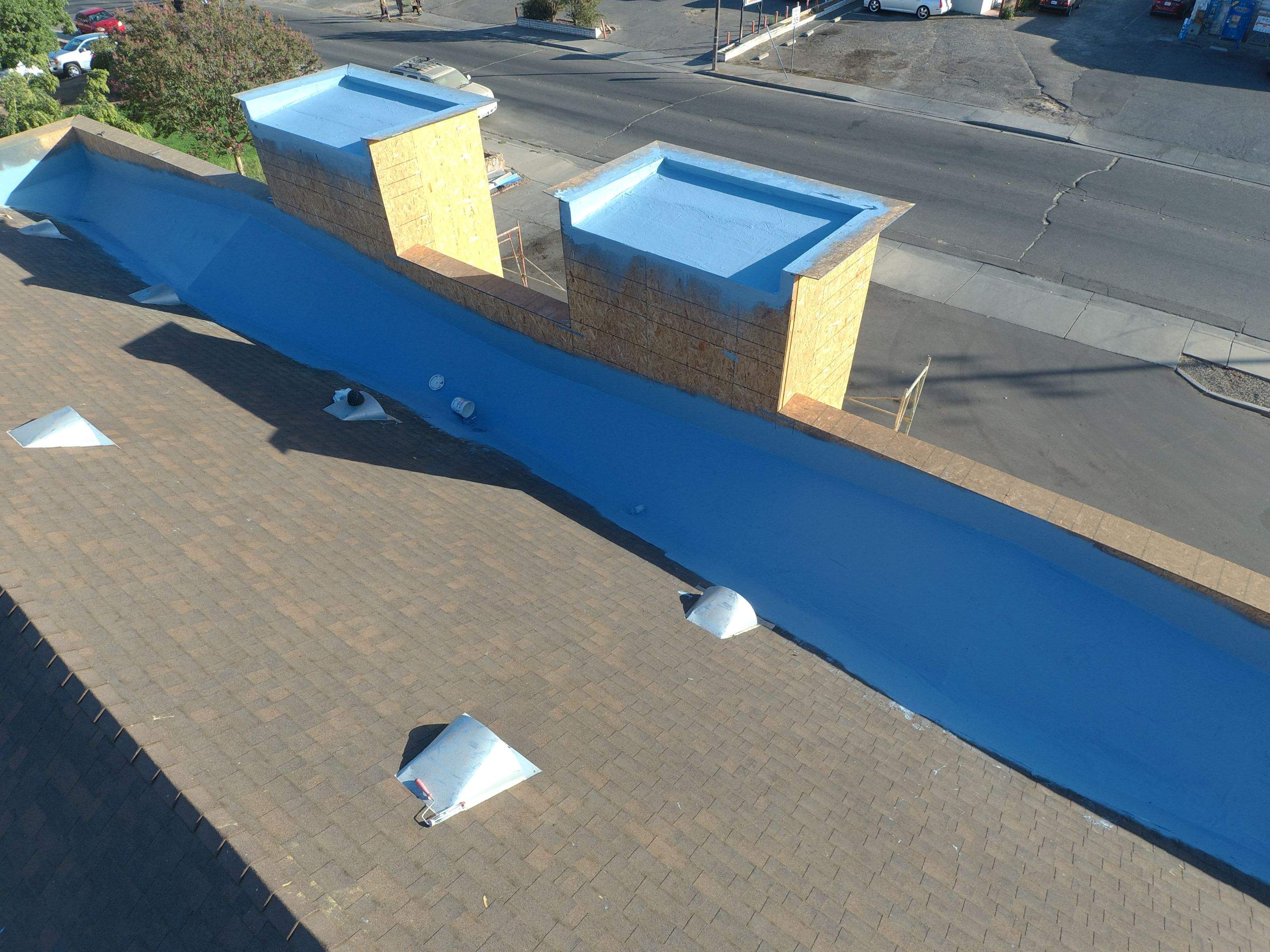 Spray foam and coatings using Conklin Benchmark/PUMA XL coatings and spray foam by Straight Edge Roofing Inc