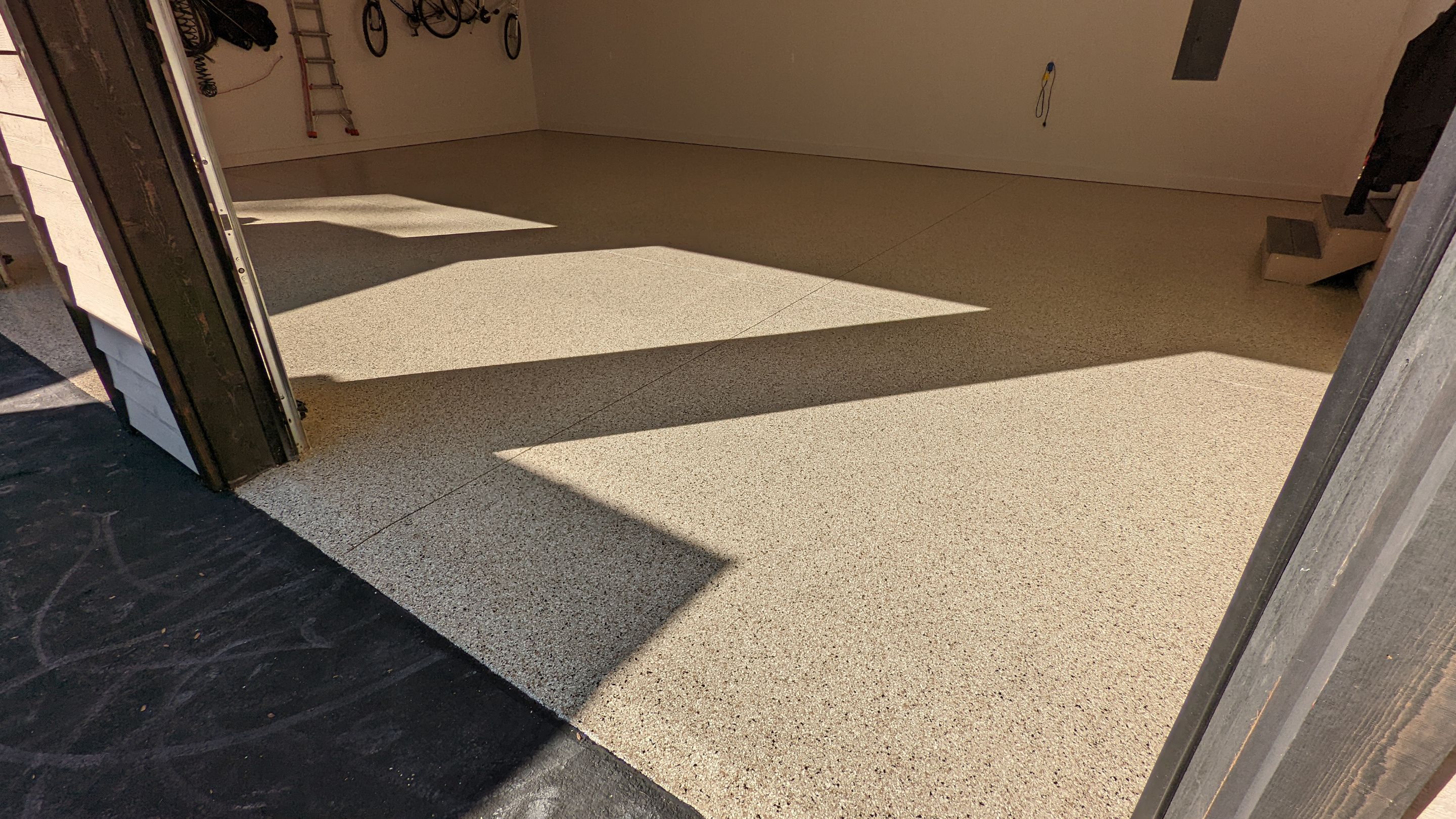 Driftwood Flake Garage Floor Transformation in Coeur d'Alene by Croc Coatings, LLC