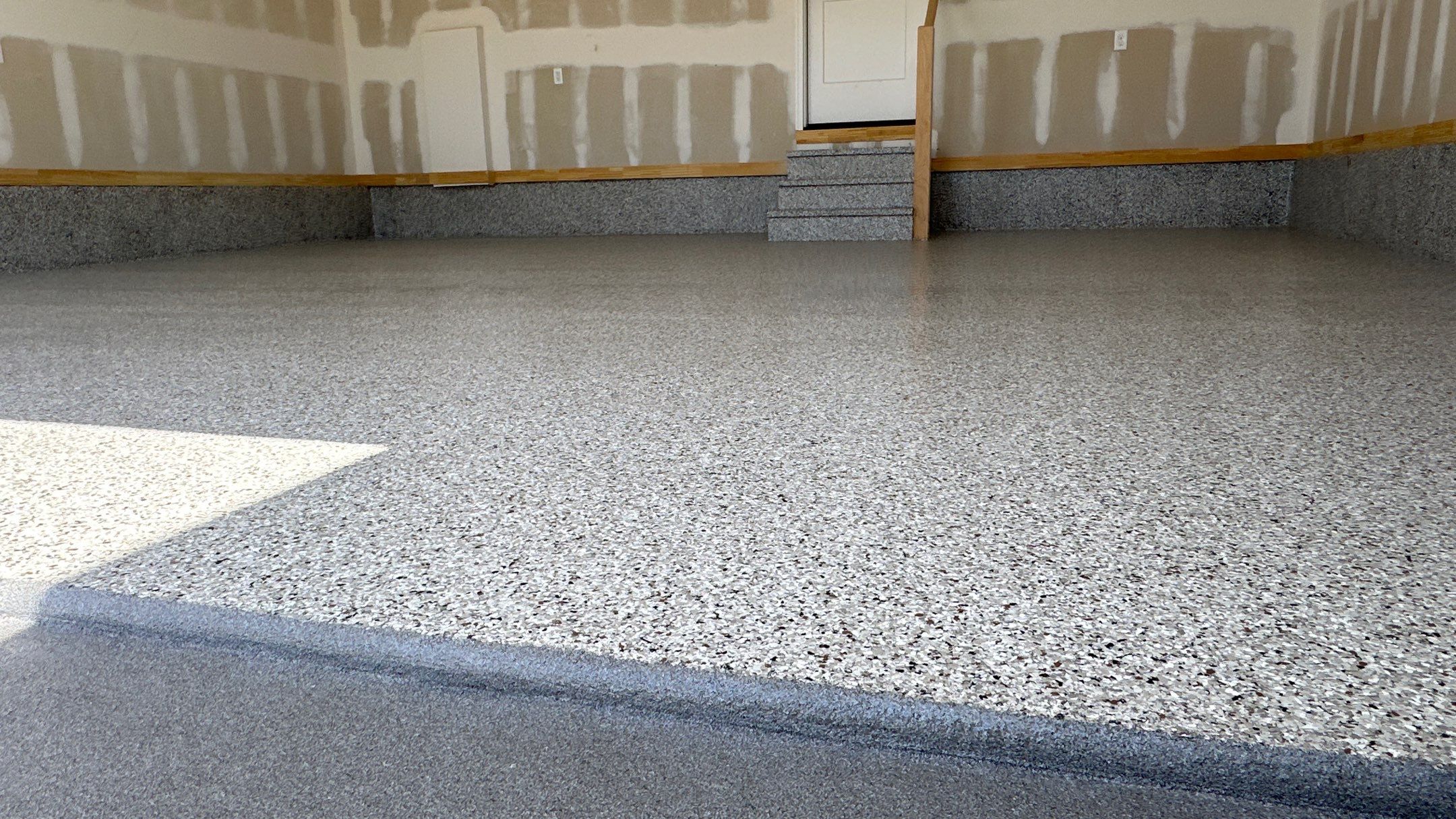 Phil B. new floor with Coyote flake by Banner Garage