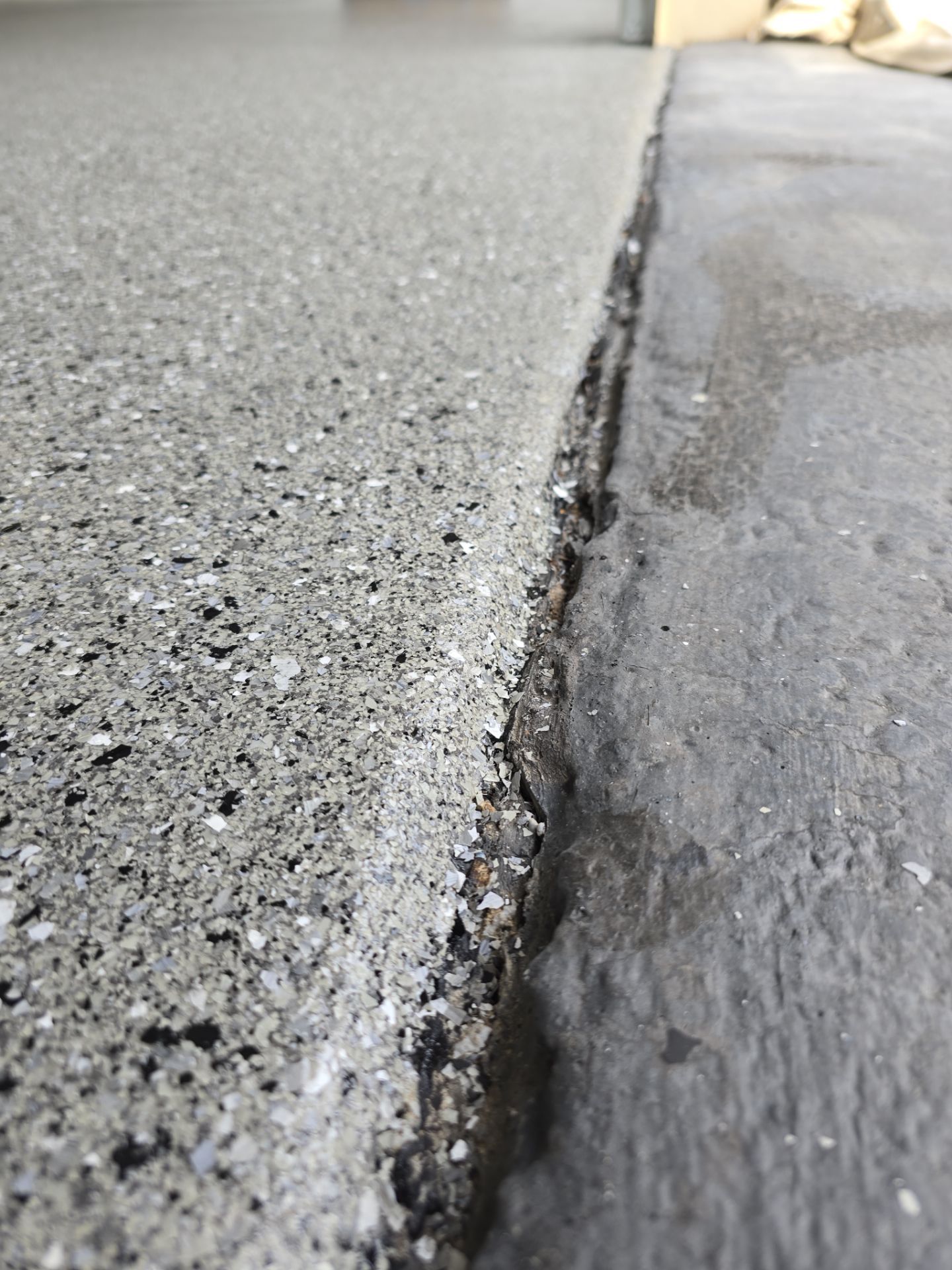 Garage Transformation using Slate Hybrid by Croc Coatings, LLC