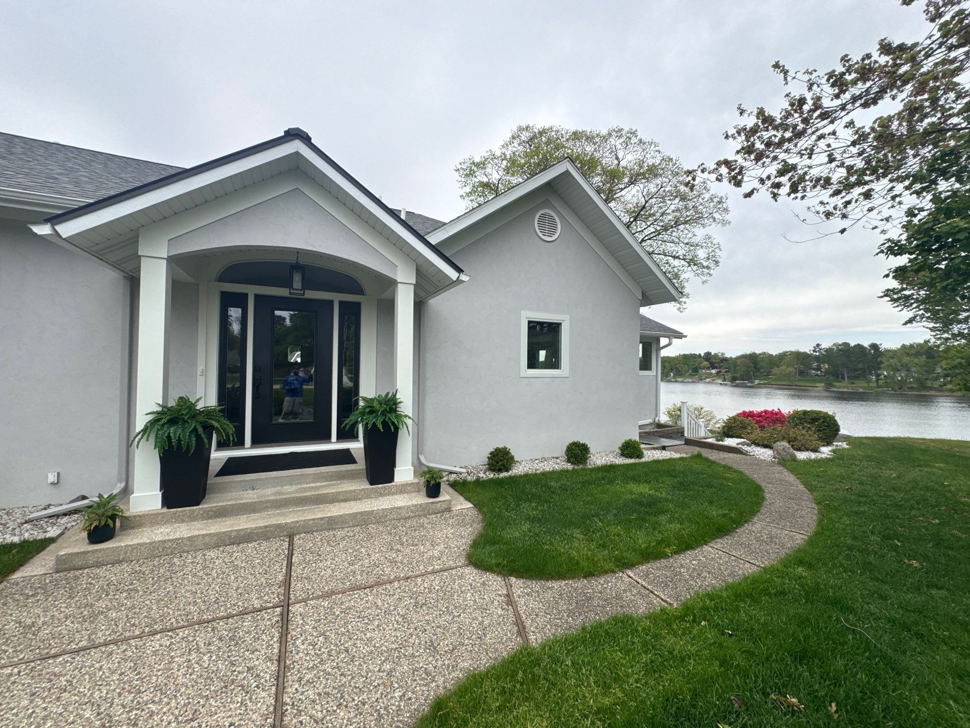 Norton Shores Residential Stucco Repair and Exterior Painting Refresh by Gordon Painting