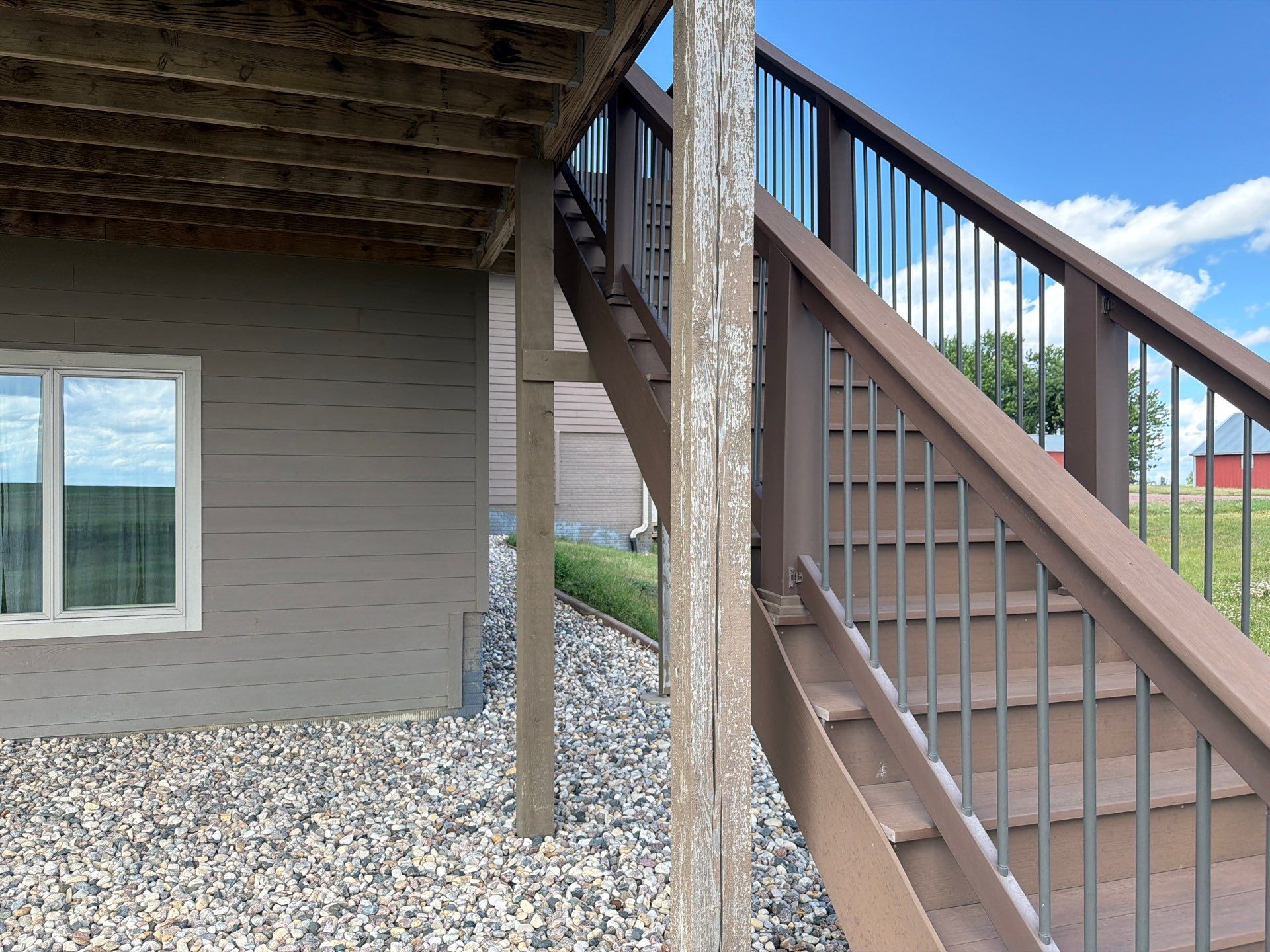 Full Exterior Siding Paint Restoration and Refresh in Garretson by Select Painting, Coatings & Garage Cabinets