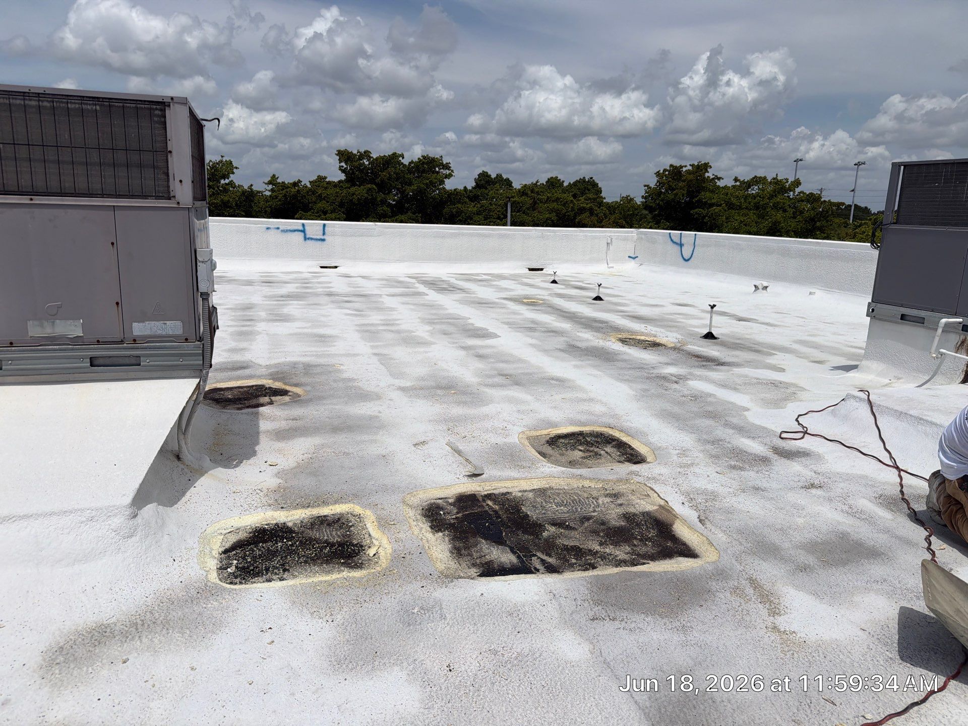 Commercial Flat Roof Restoration and Elastomeric Waterproofing in Delray Beach by Roof King LLC