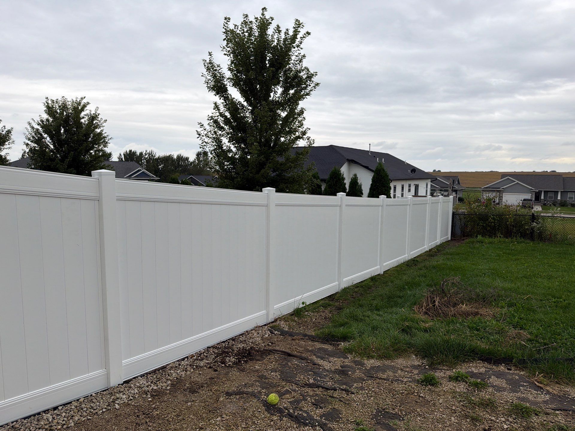 Residential Vinyl Privacy Fence Installation in Urbana by Perfect Picket Fence and Stain
