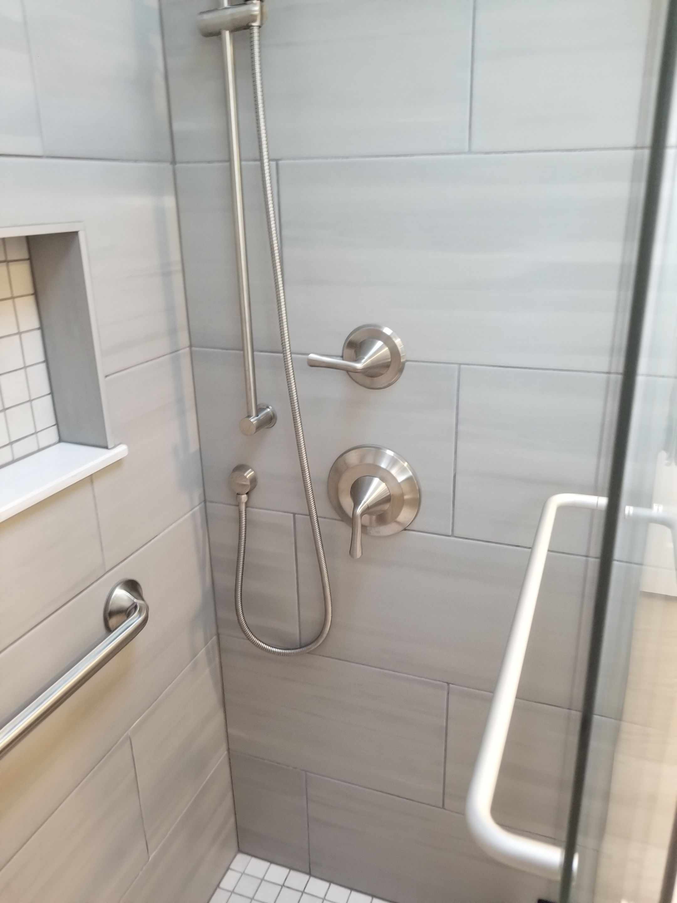 Remodel full bathroom new tile walk in shower plus 2nd half bath Powder room in Livonia, MI by Northwest Construction