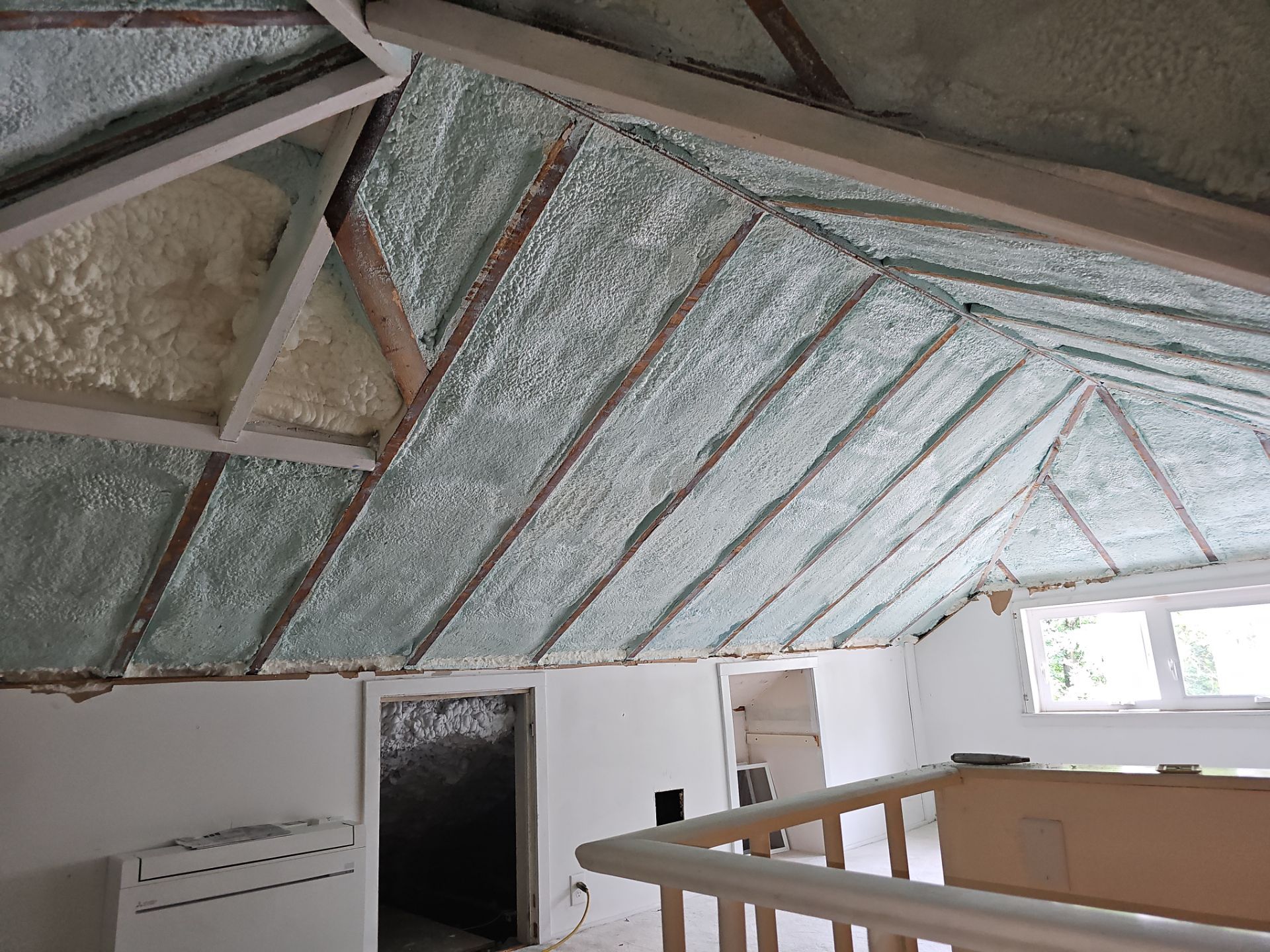 Attic Insulation using open cell spray foam by NYS Foam & Energy