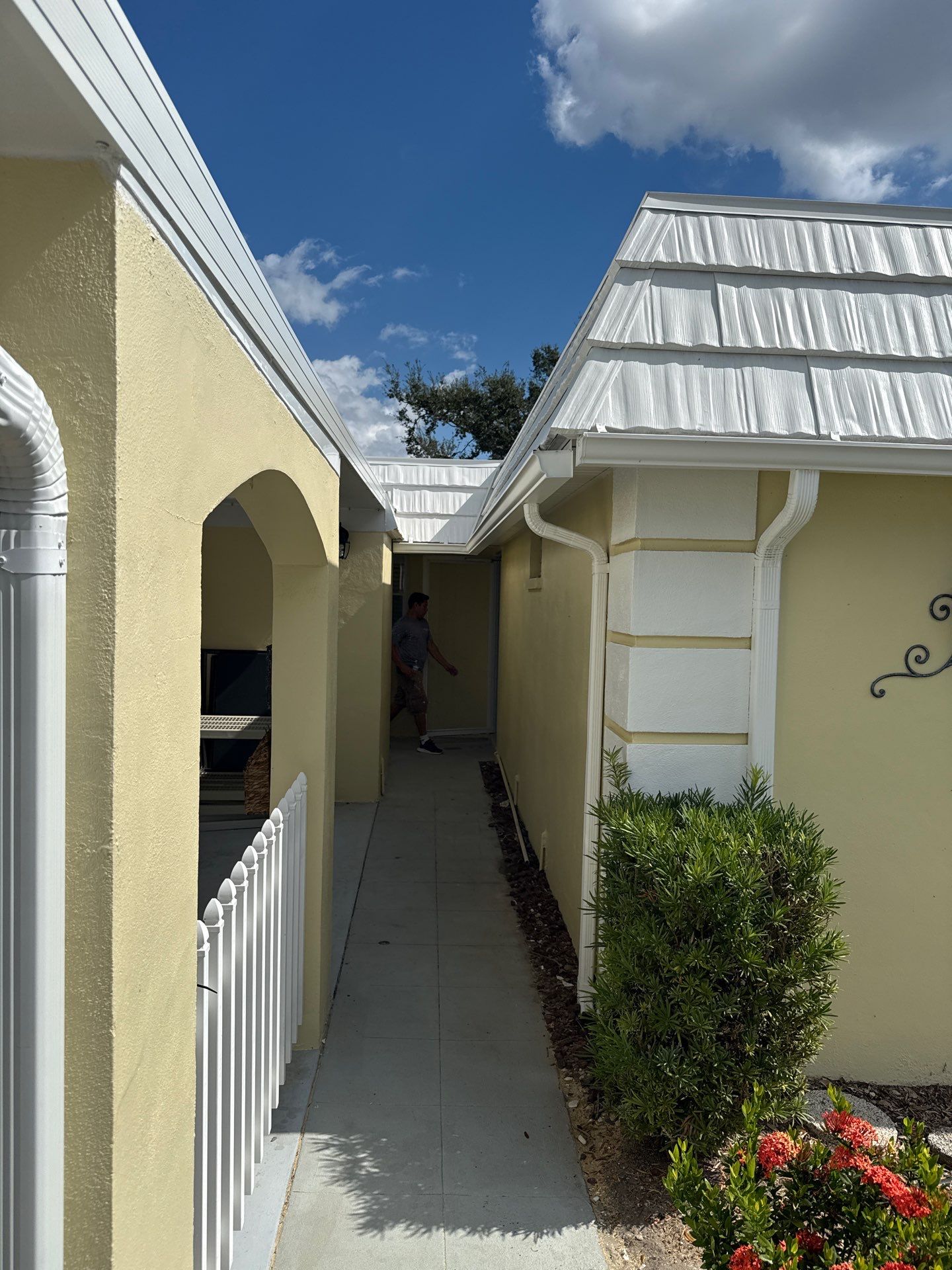 White Gutters and Matching Downspouts in Sarasota FL by Gutter Professors