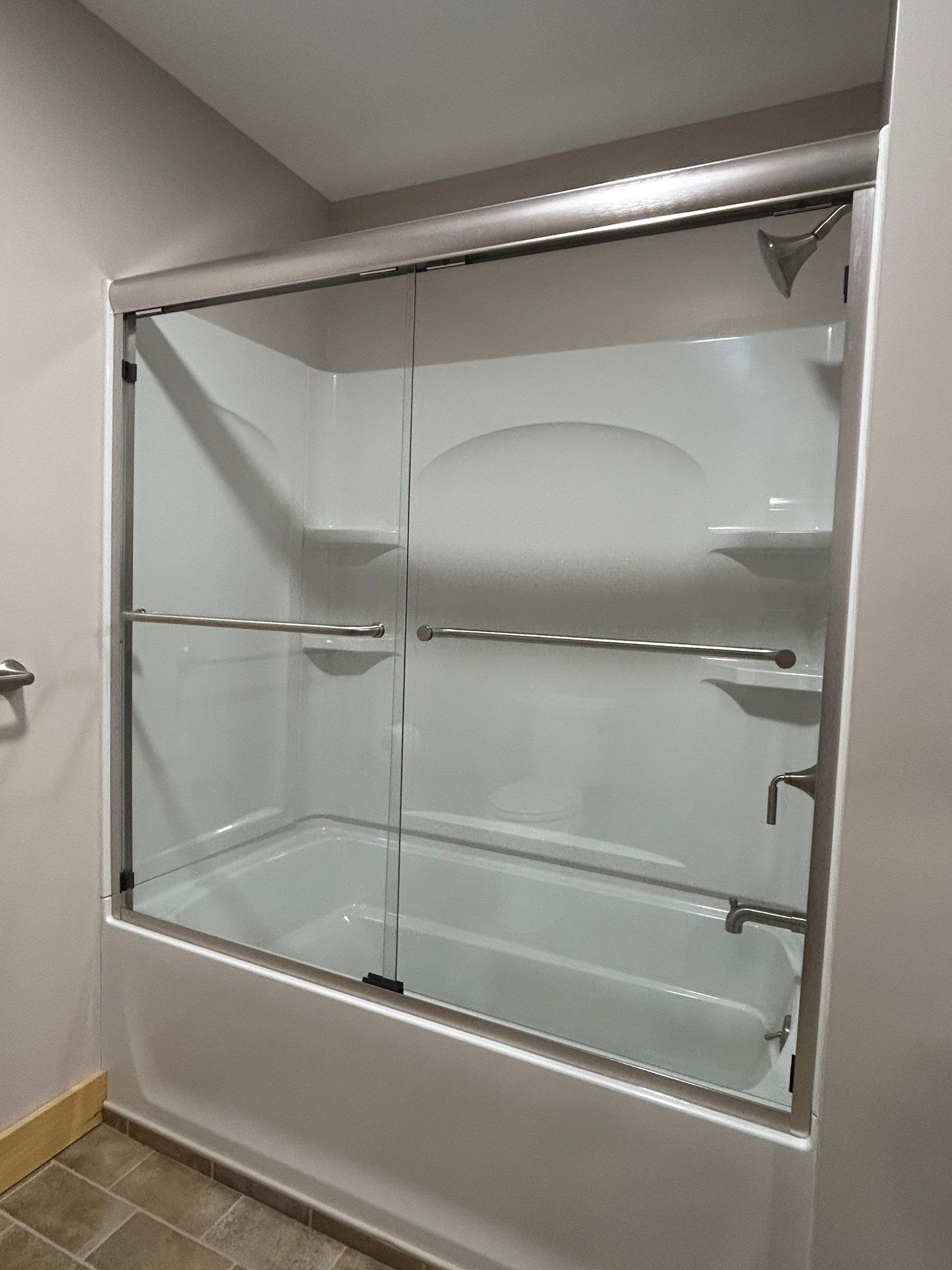 Two Showers using Alumax Shower by Cheshire Glass Company