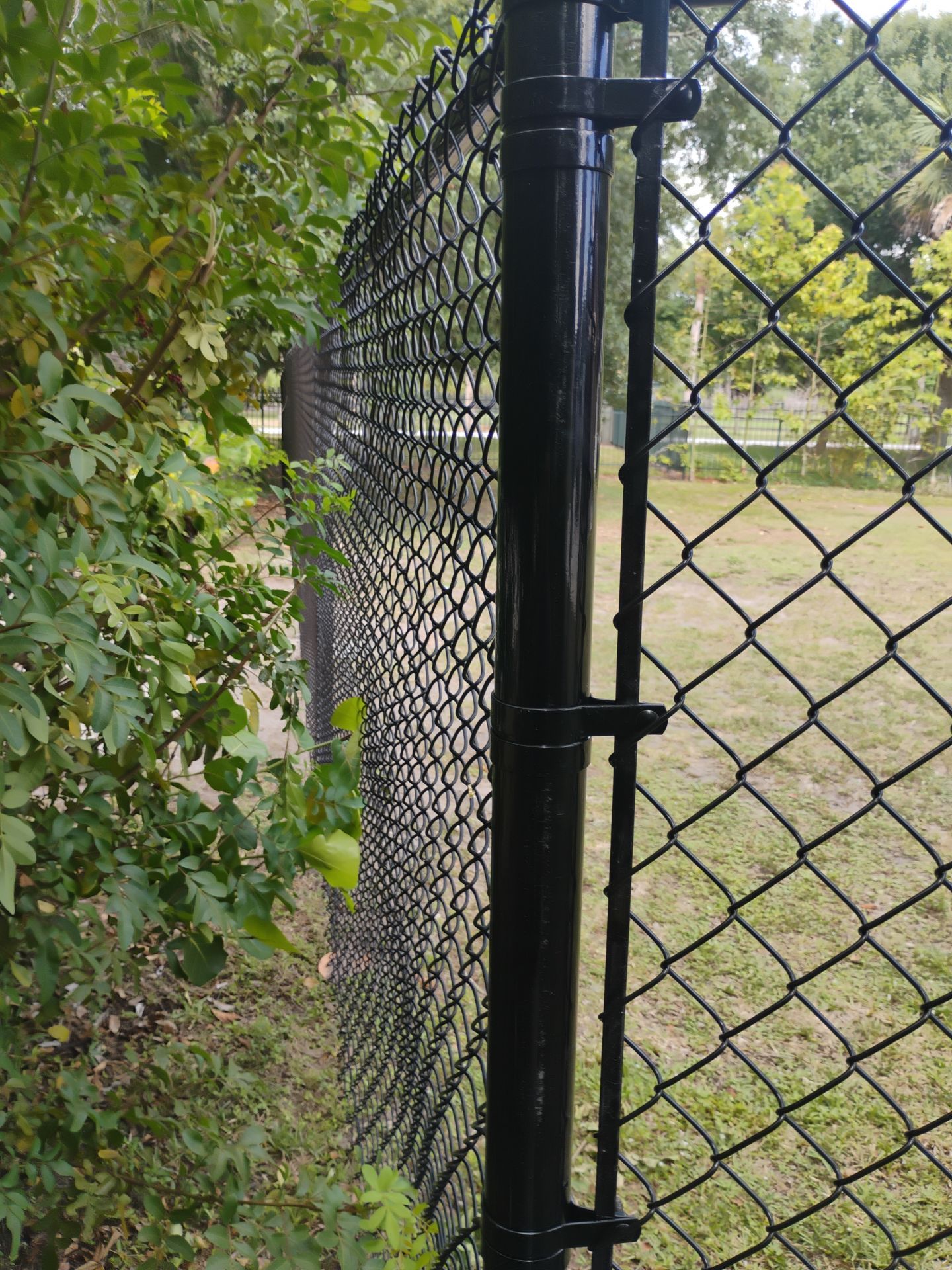 Black Vinyl Chain Link Fence Installation in Arcadia Florida by True Fence LLC