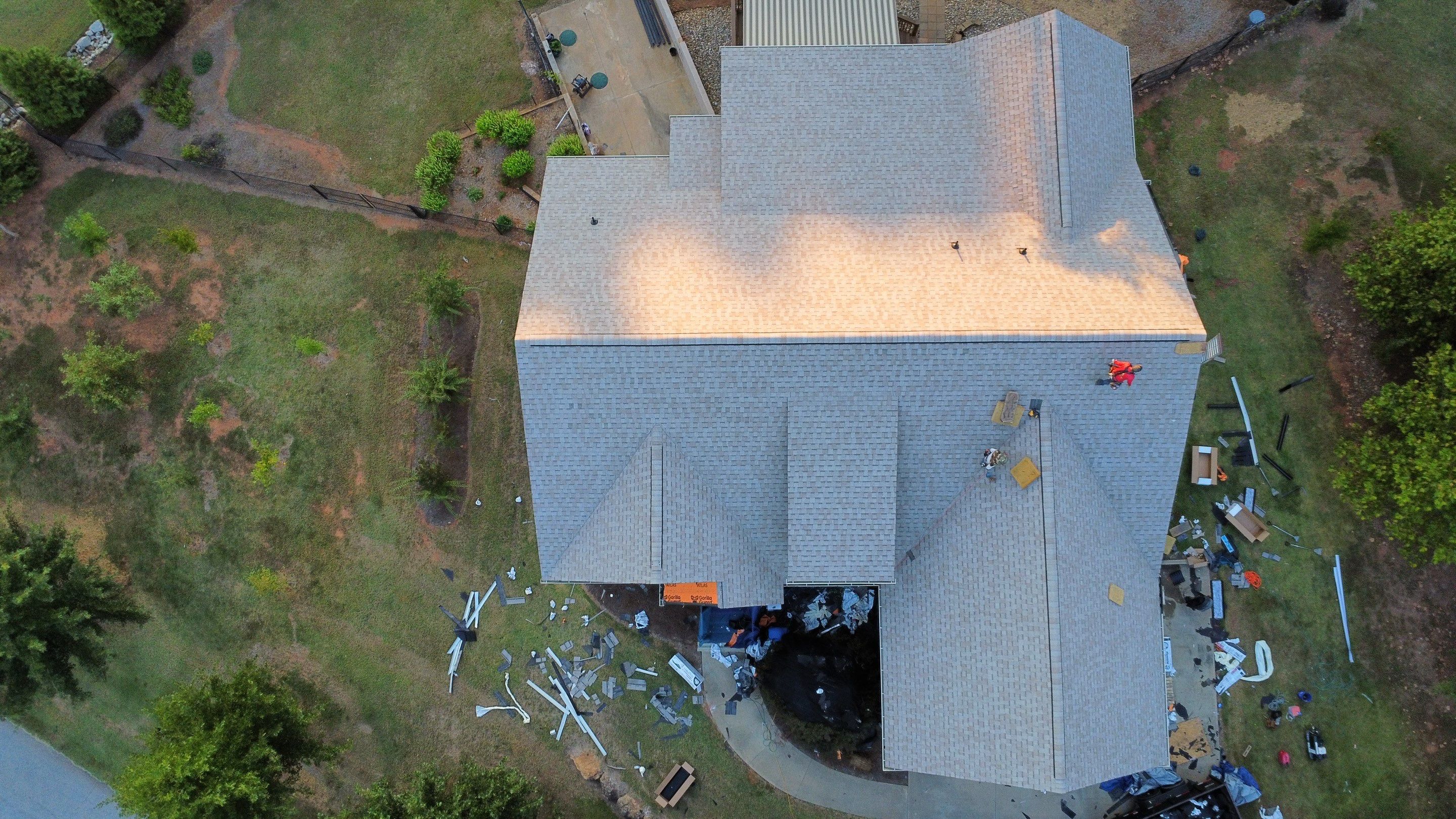 Insurance Covered Full Replacement with Atlas 25 Year Labor & 50 Year Manufacture Warranty by Roofsters