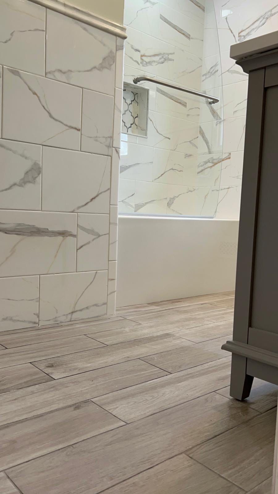 Bathroom Remodel using Tile by Home Concepts Construction