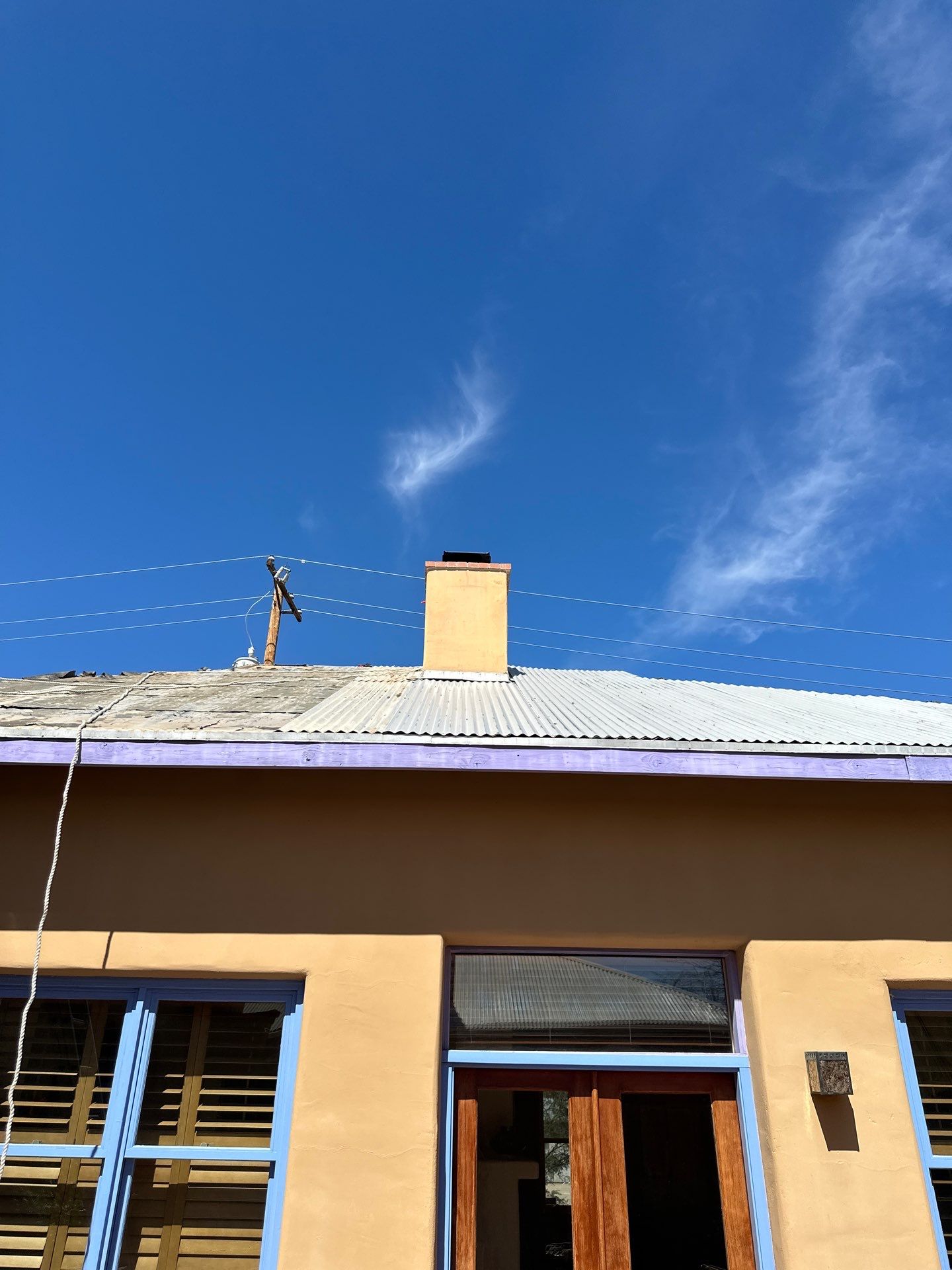 Metallic Silver Exposed Fastener by Reimagine Roofing