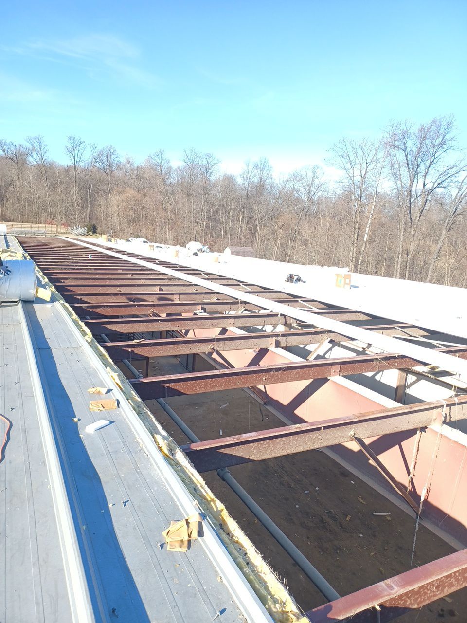 Commercial Roofing Installation using 24 Guage Double Lock Standing Seam by CentiMark Roofing