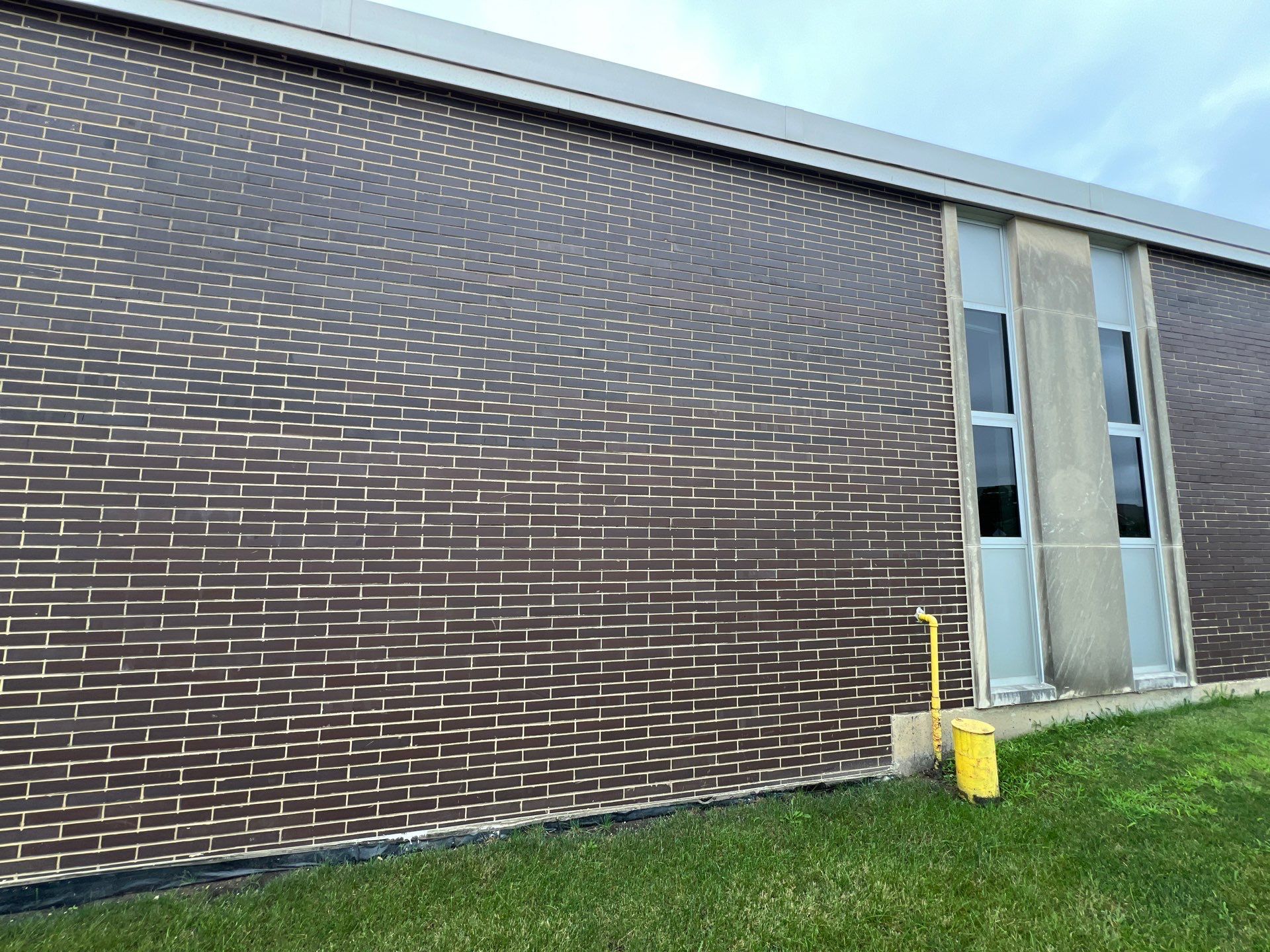 commercial pressure washing using Algaecide, soft wash soap by Northern Power Washing LLC.