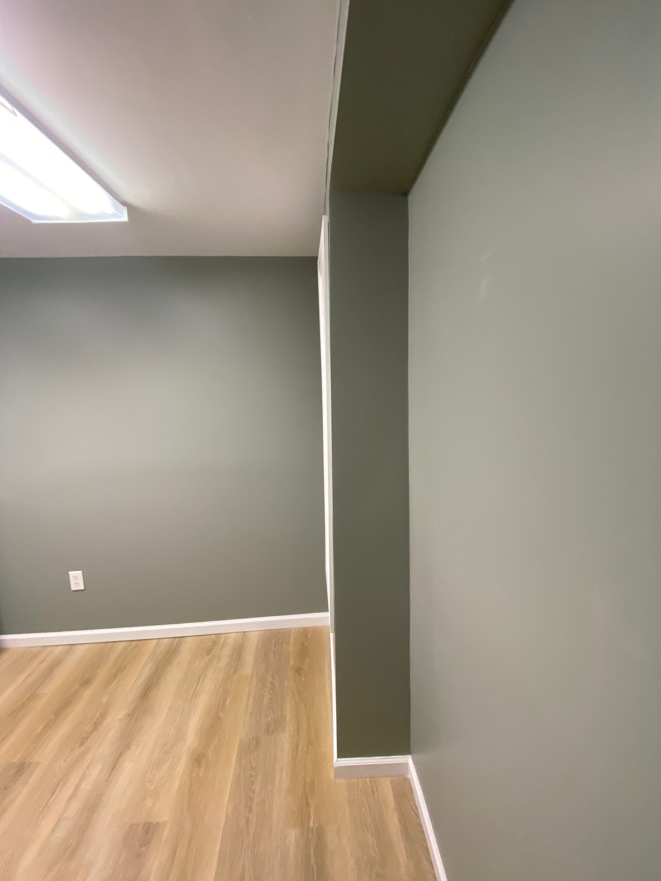Laundry Room Redmodel using Lifeproof Luxury Vinyl Plank Flooring by The Smet Companies, LLC