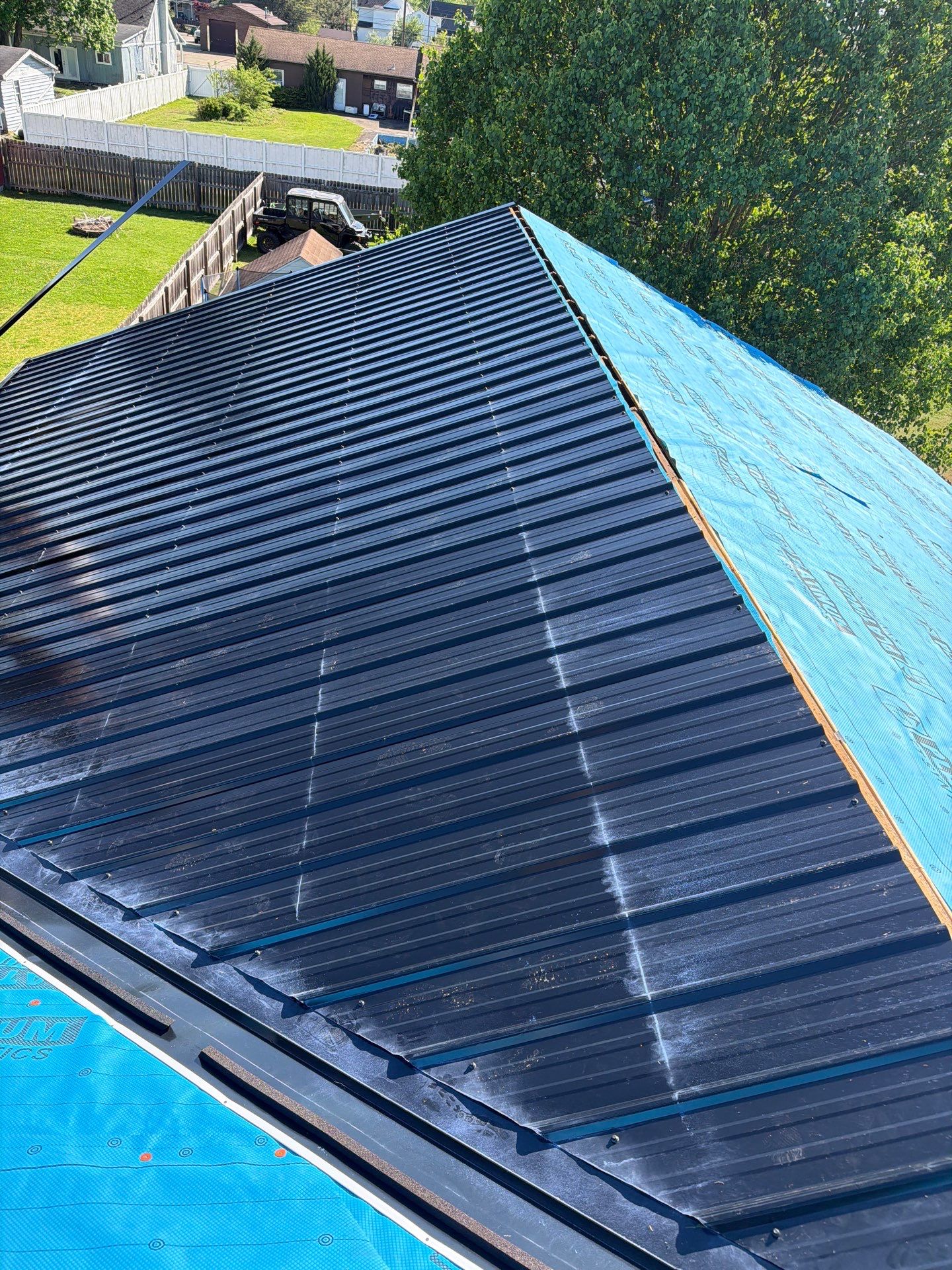 Residential Roofing Installation using Metal by Rainstoppers Roofing