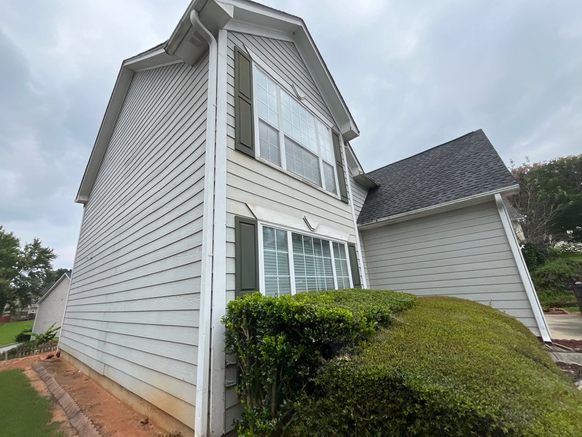 Lawrenceville, GA Full Siding Replacement, Exterior Painting, and Window Installation by Nelson Exteriors 