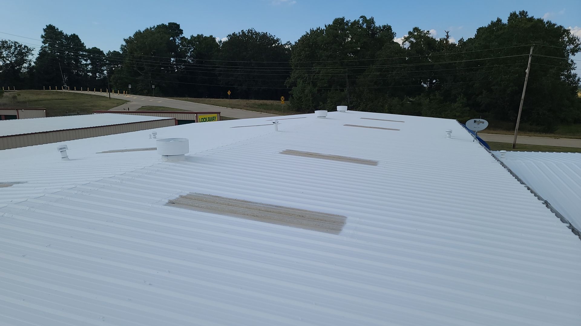 Commercial Metal Restoration System using Aldocoat Coatings by Hostetler Roofing