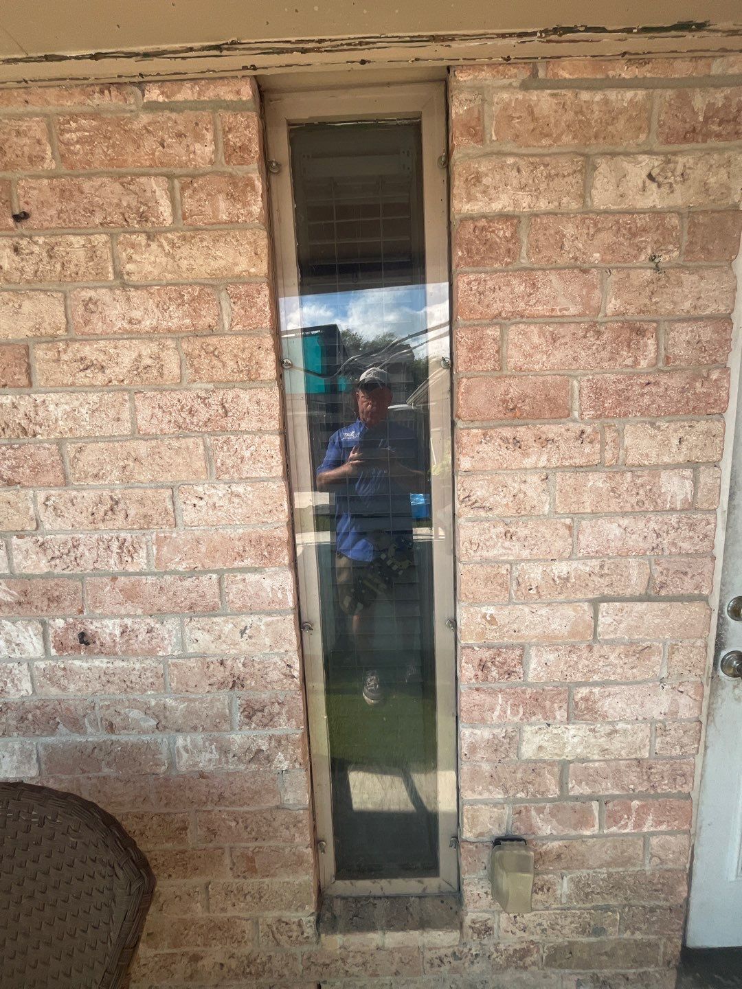 Colored Vinyl Windows to blend into brick by Bayfront Roofing and Construction