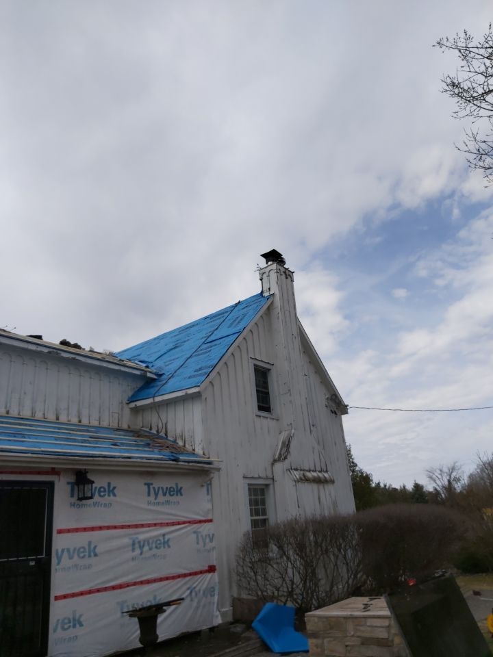 Residential Roofing Installation using 16" Standing Seam Panels by Jay Carter Roofing & Sheet Metal