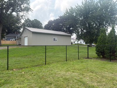 Residential Black Chain Link Fence Installation in Reinbeck