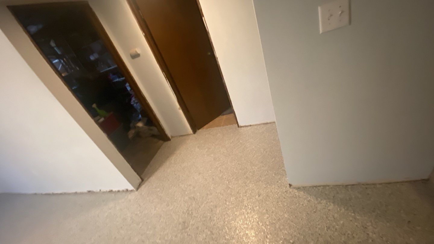 Basement using Tidalwave by Select Painting, Coatings & Garage Cabinets