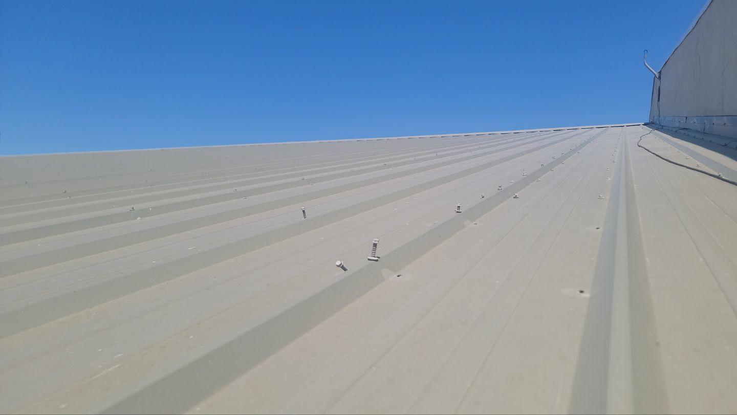 Commercial Roof Replacement – PBR Metal Panels After Hail Damage by ASAP Roofing & Exteriors