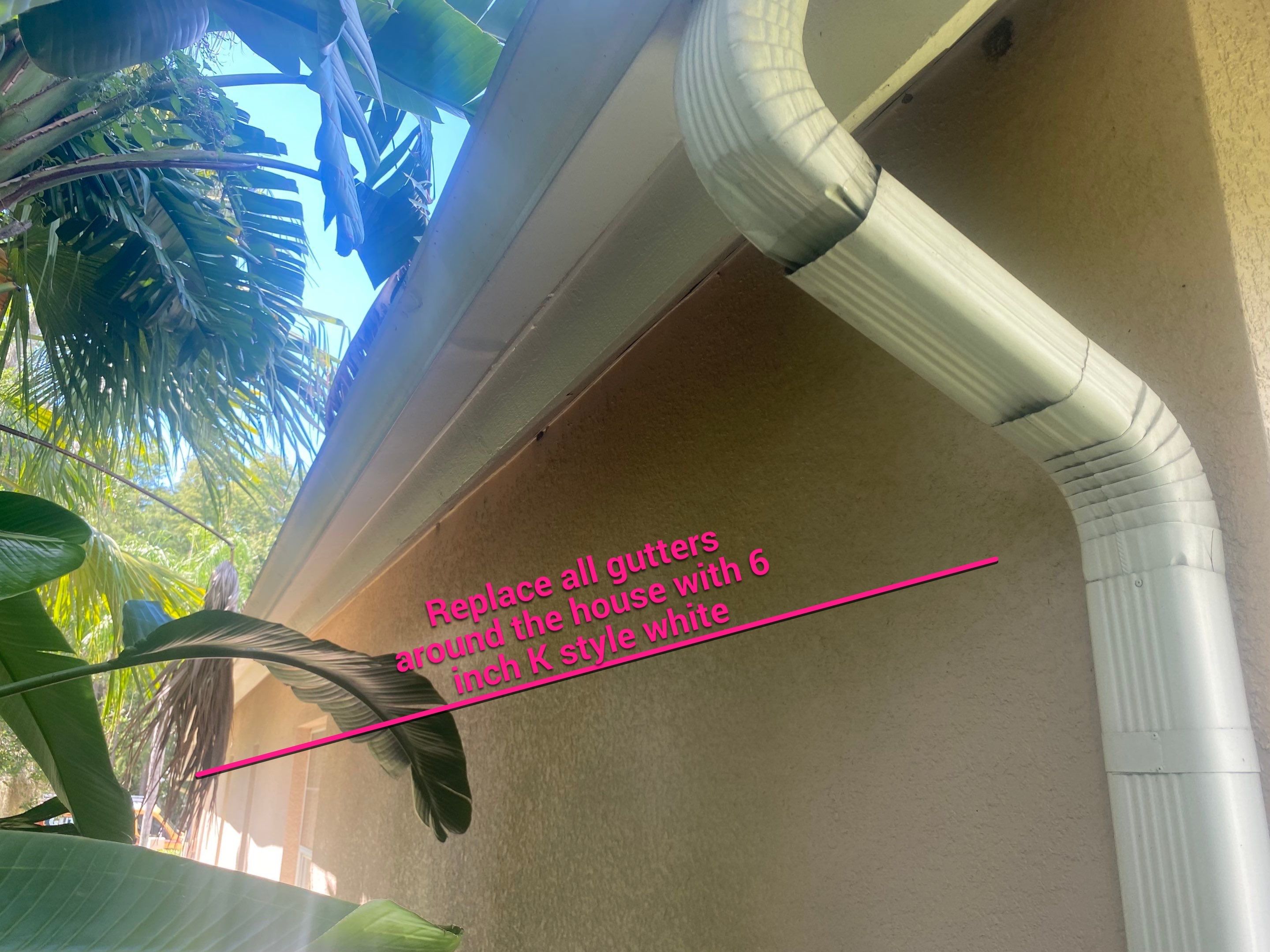 White Gutters and White Downspouts by Gutter Professors