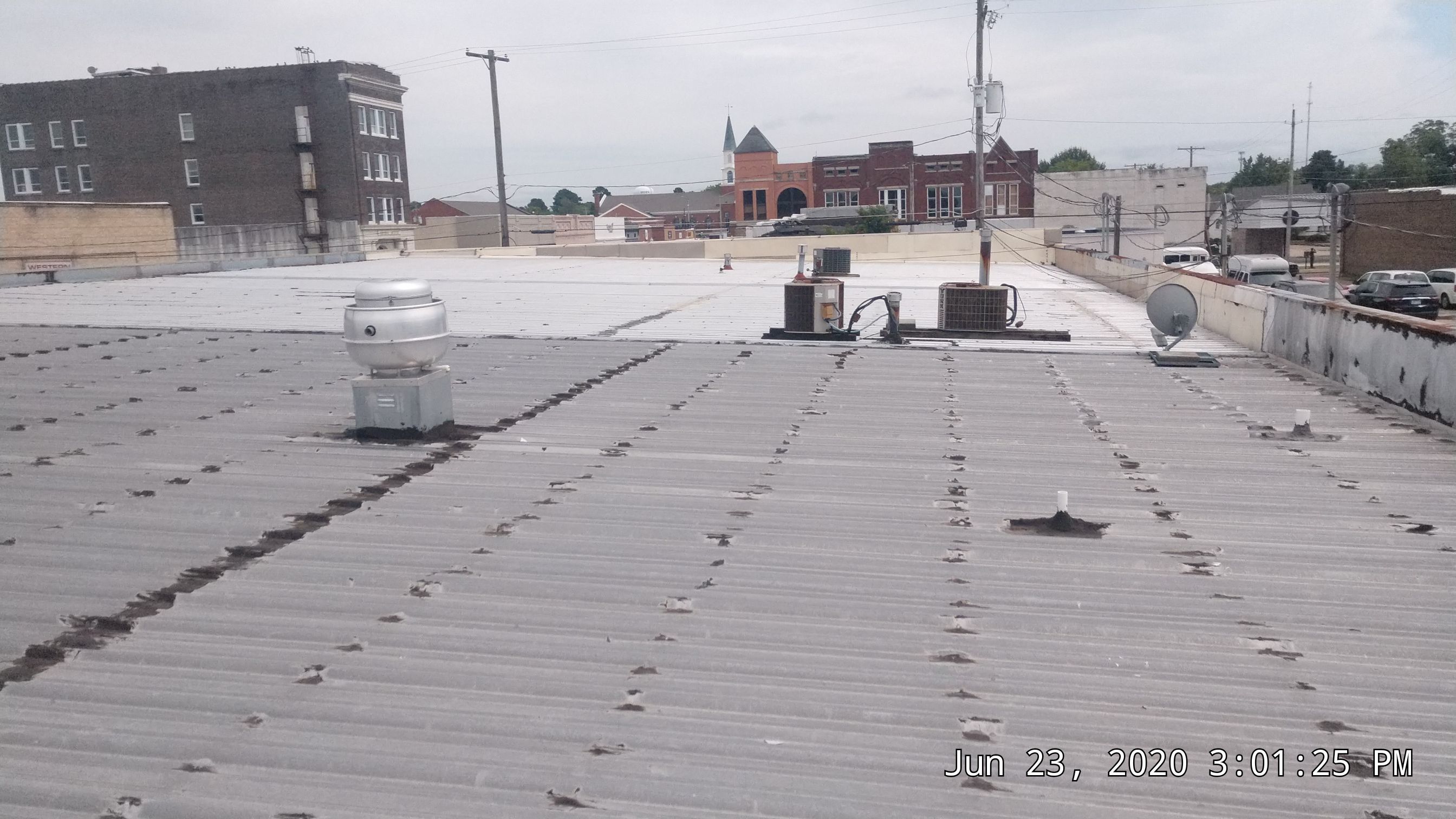 Commercial Metal Restoration System using Aldocoat Coatings by Hostetler Roofing