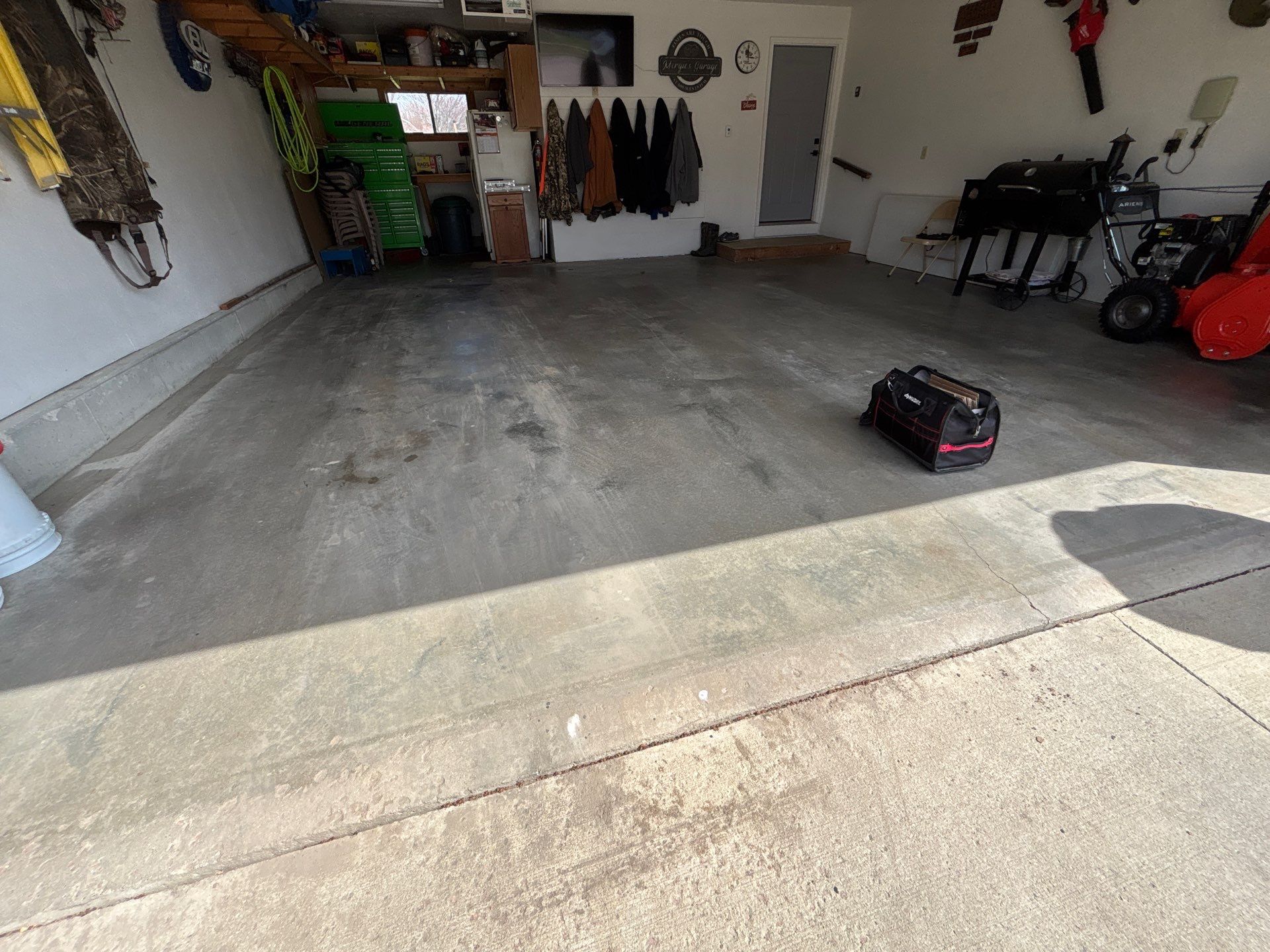 Smoke Flake Garage Floor Coating in Dell Rapids by Select Painting, Coatings & Garage Cabinets