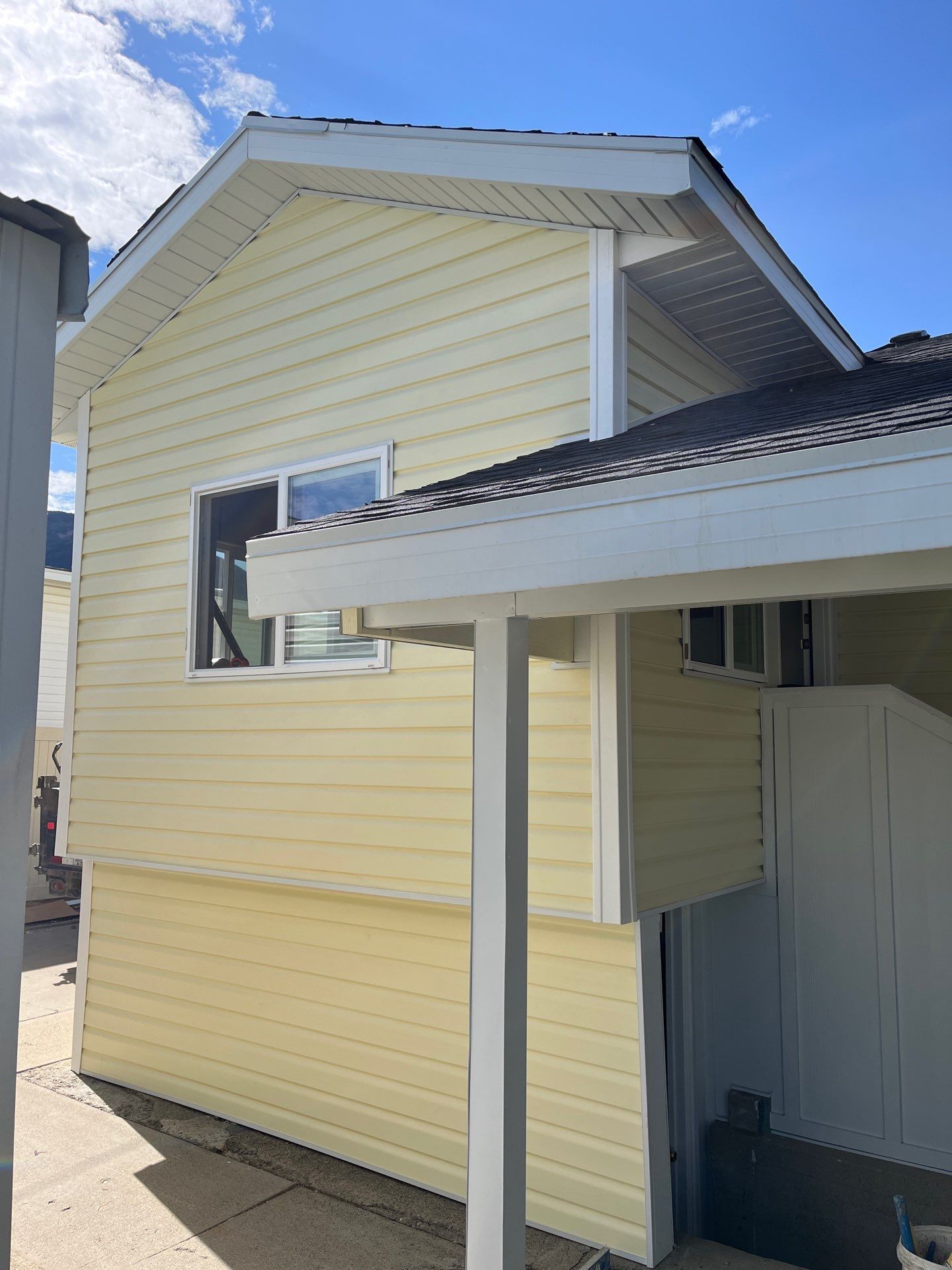 Tooele | Custom Color-Matched Vinyl & Hardie Upgrade | Colonial Yellow by Ideal Siding Utah