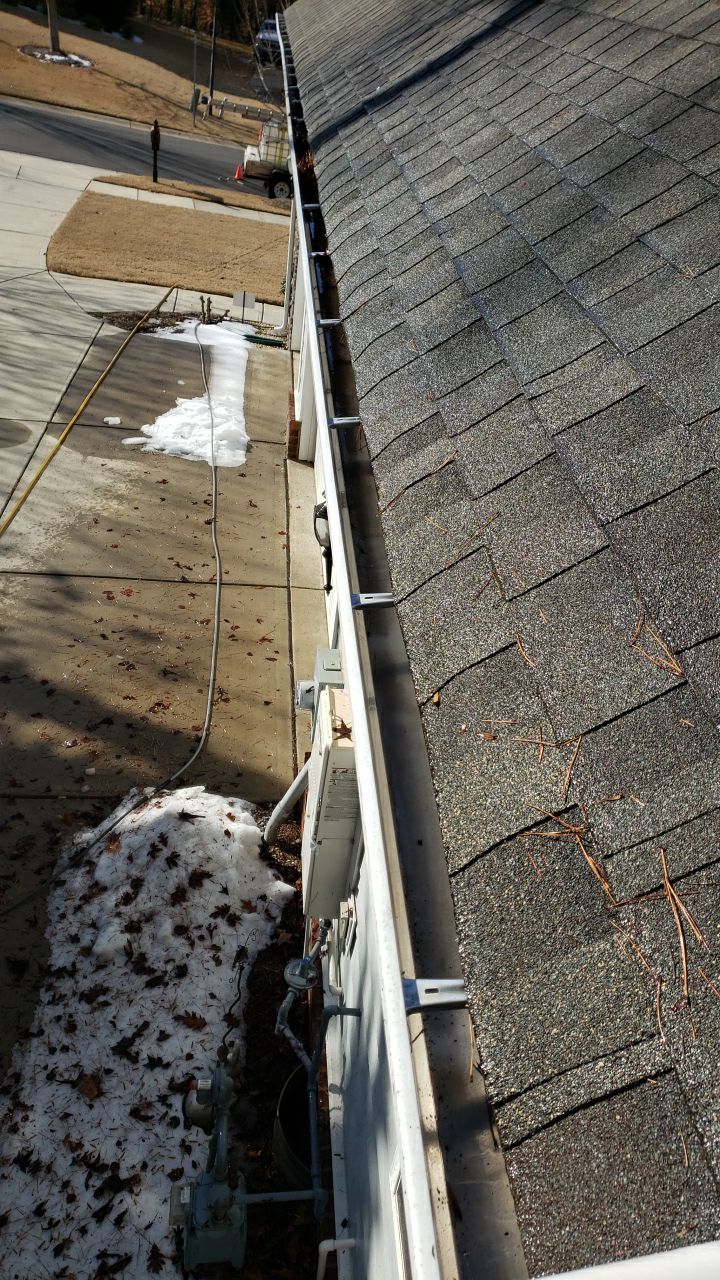 Gutter Cleaning using water by G&H Home Tech Pros LLC