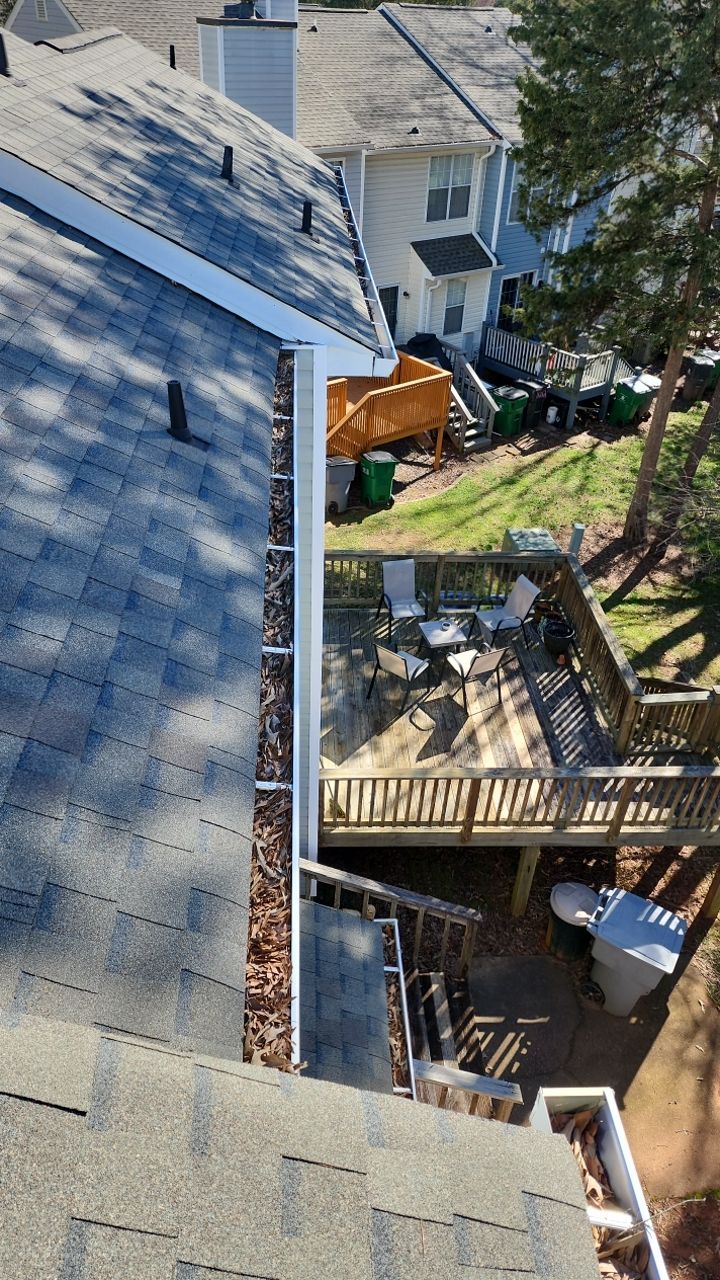 Gutter Cleaning using water by Power Wash Masters LLC
