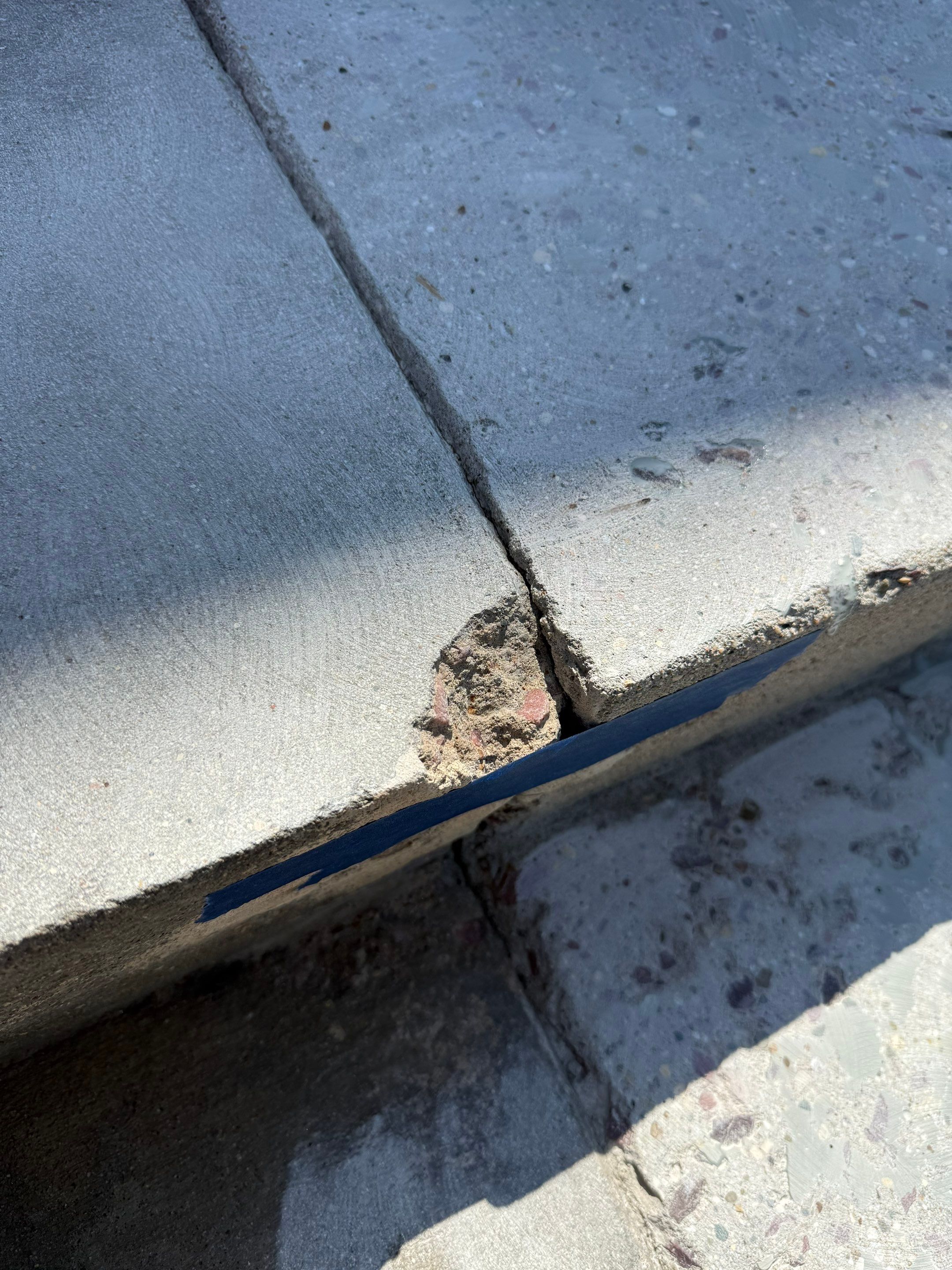 Concrete Stair Repair and Protective Coating in Sioux Falls by Select Painting, Coatings & Garage Cabinets