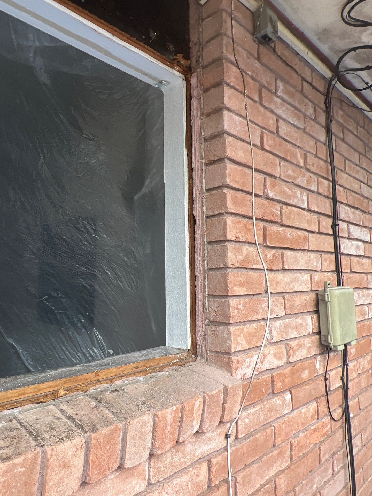 Windows in Brick with a Bay Window by Bayfront Roofing and Construction