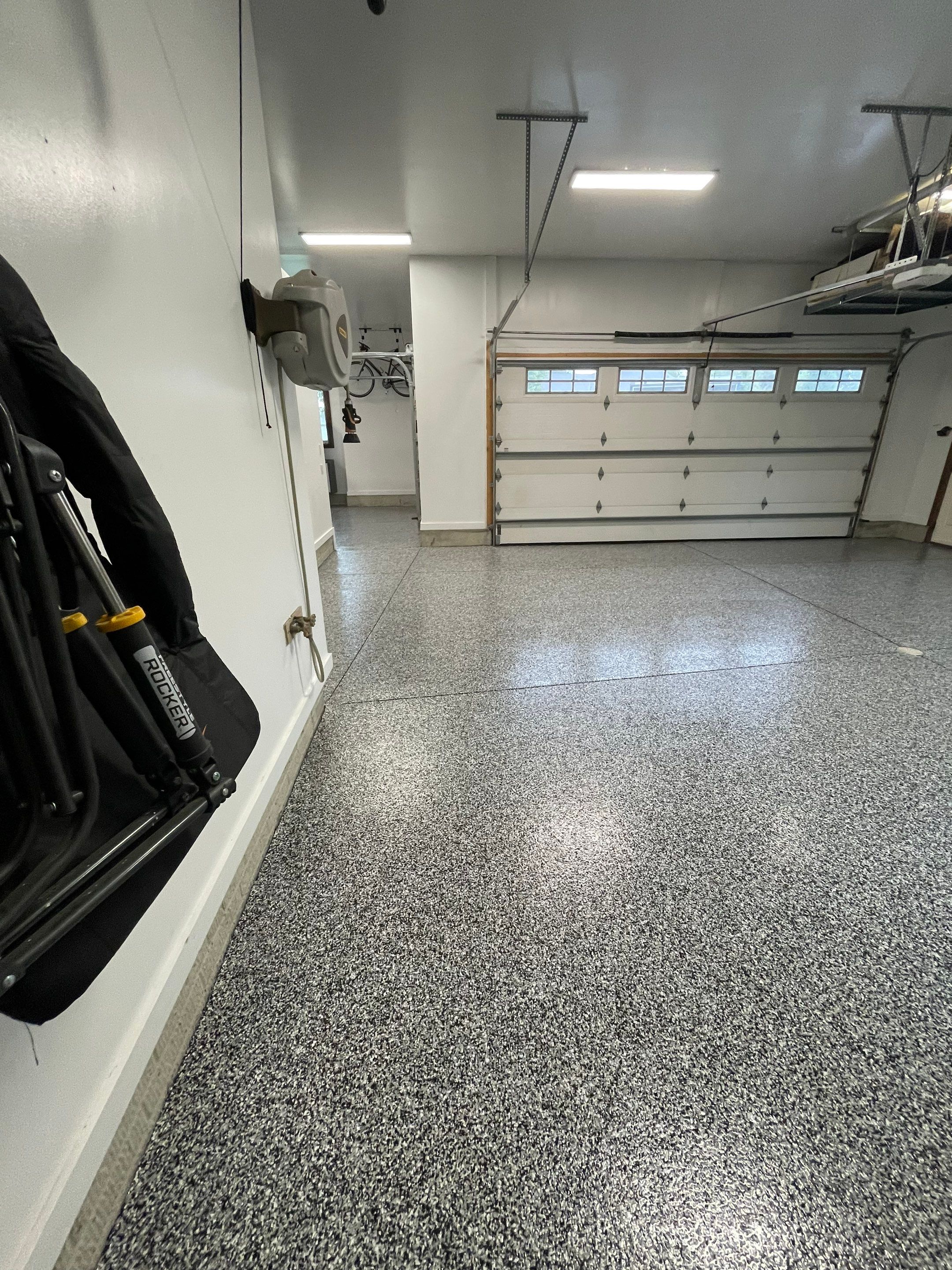 Garage Floor Coating and Domino Flake Finish in Sioux Falls by Select Painting, Coatings & Garage Cabinets