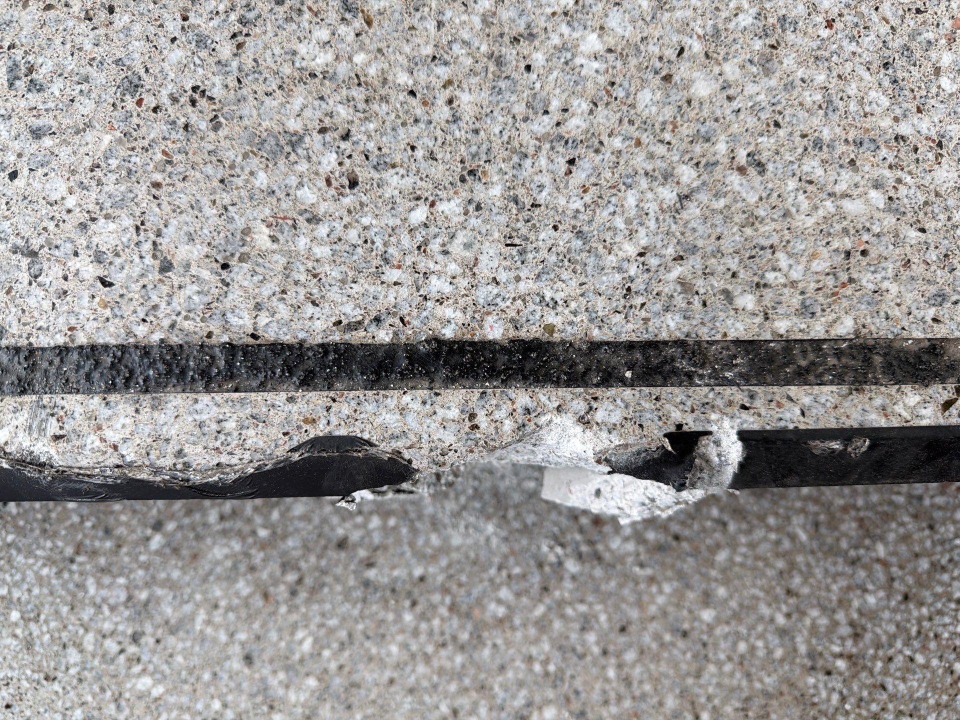 Concrete Stair Tread Restoration and Safety Upgrade in Sioux Falls by Select Painting, Coatings & Garage Cabinets