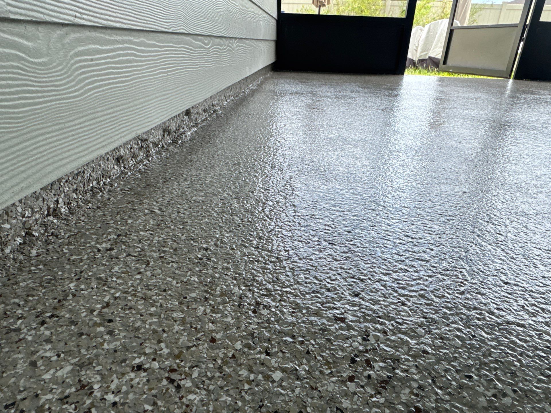 Porches Project in Newberry, FL in Pebble Beach by Cross Creek Concrete Coatings