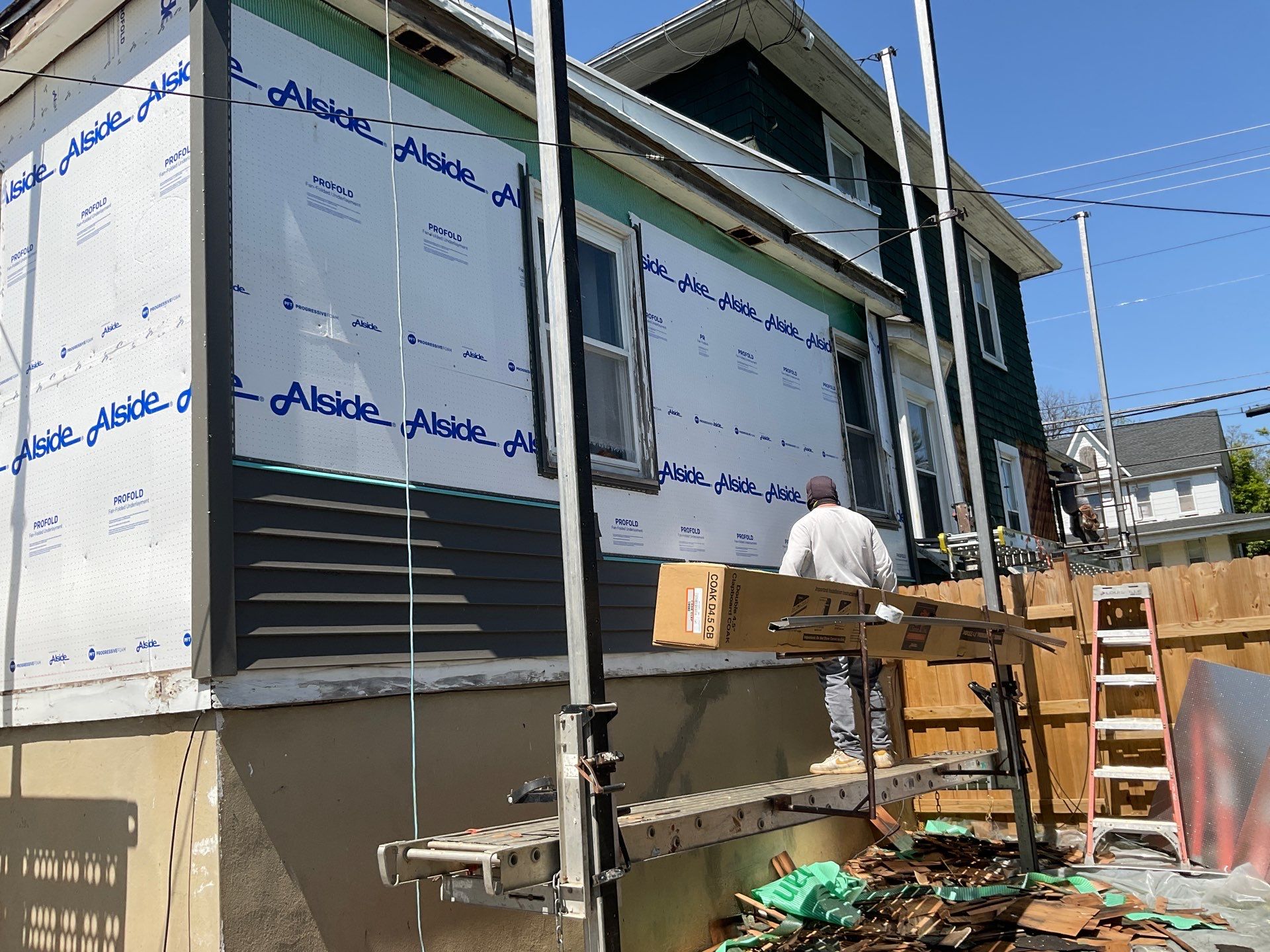 New siding & New Gutters by Alpha Design Services