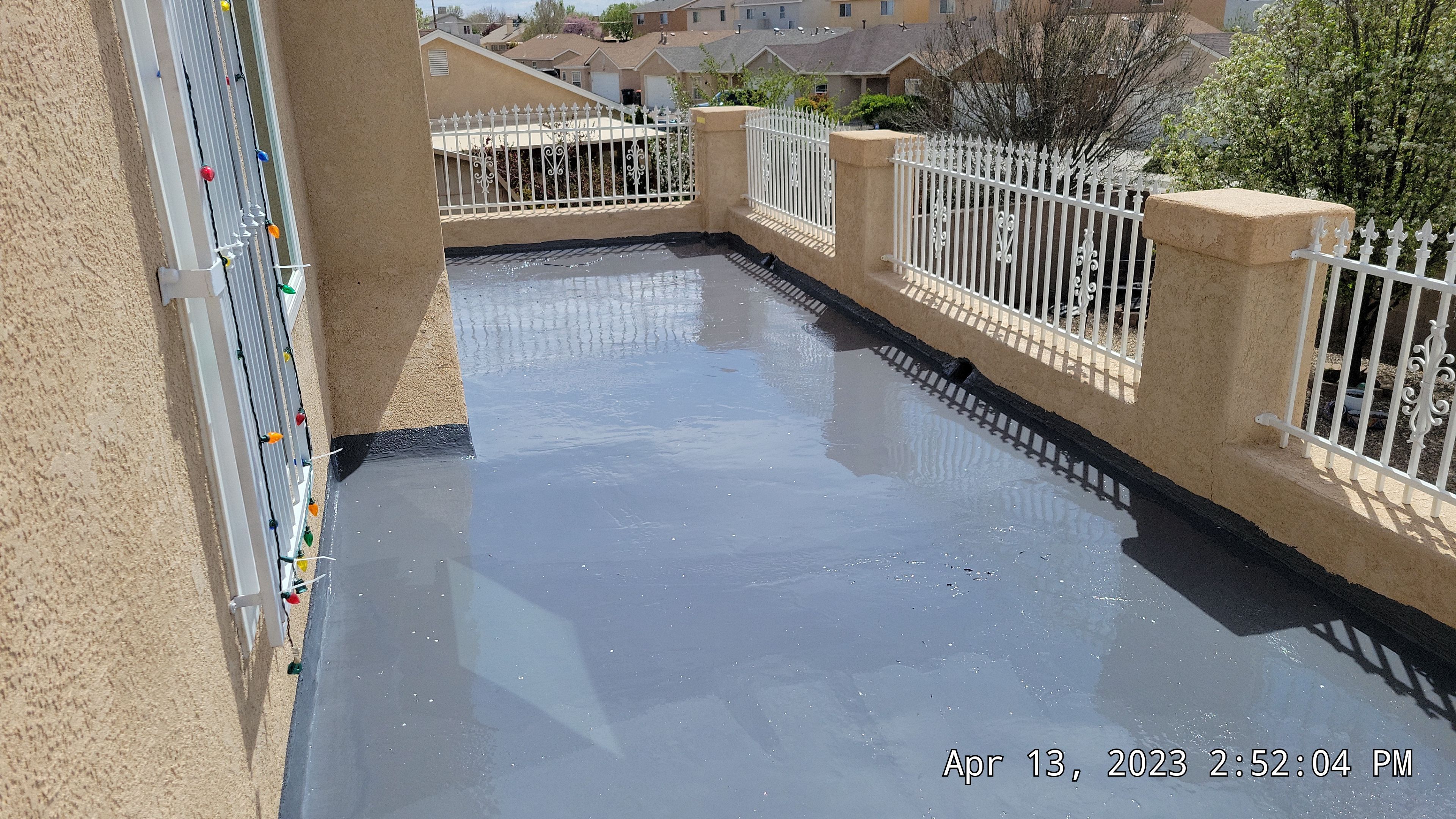 Roof deck coating and repairs by Doyle Roof Masters Inc