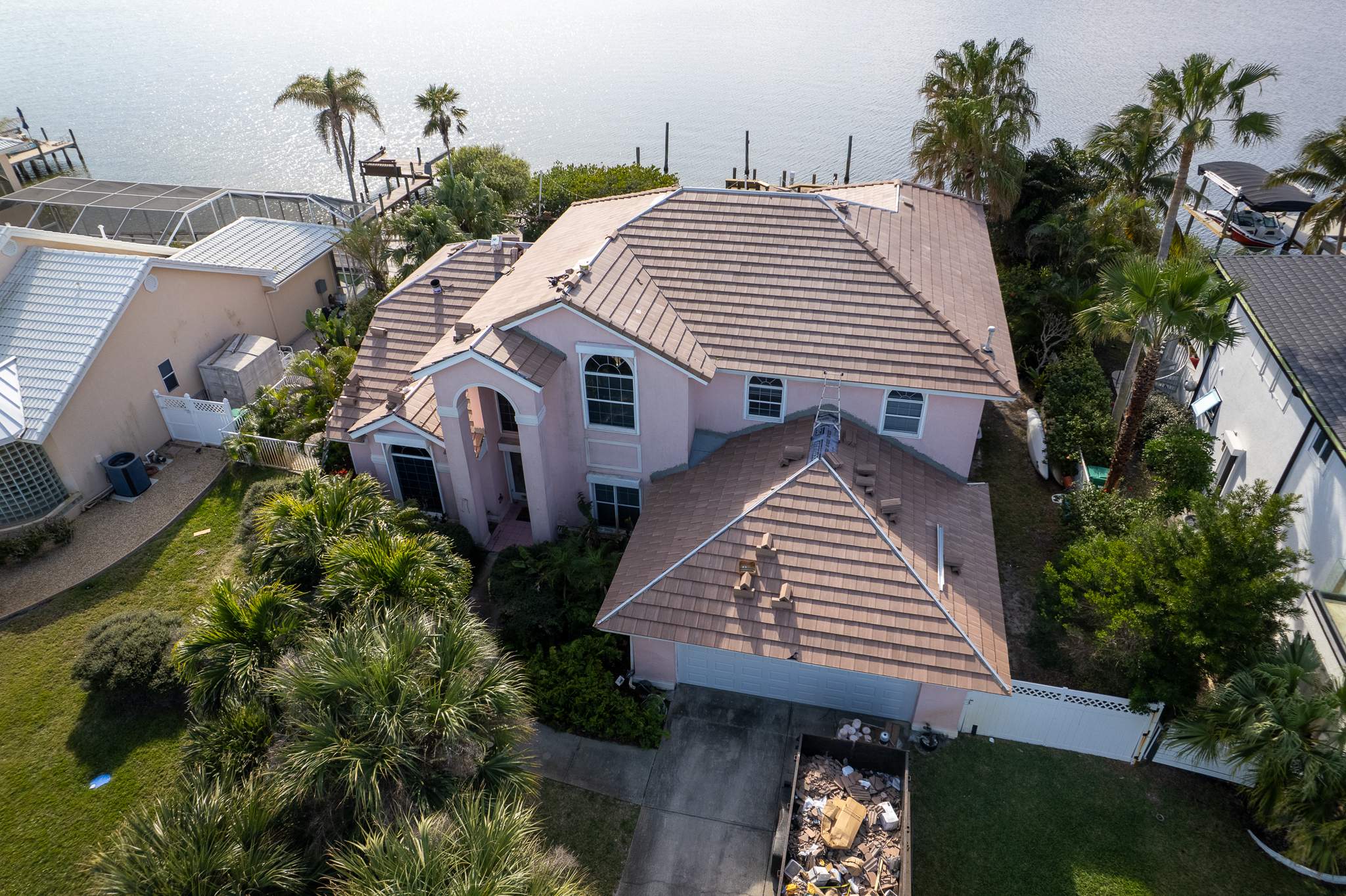 Full Clay Tile Roof Replacement and Deck Repair in Cocoa Beach, Florida by Wiedmann Construction & Roofing
