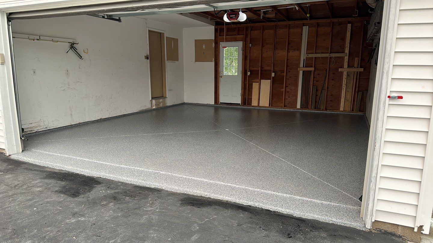 Silverado garage floor and patio coating  by NG Masonry & Construction LLC